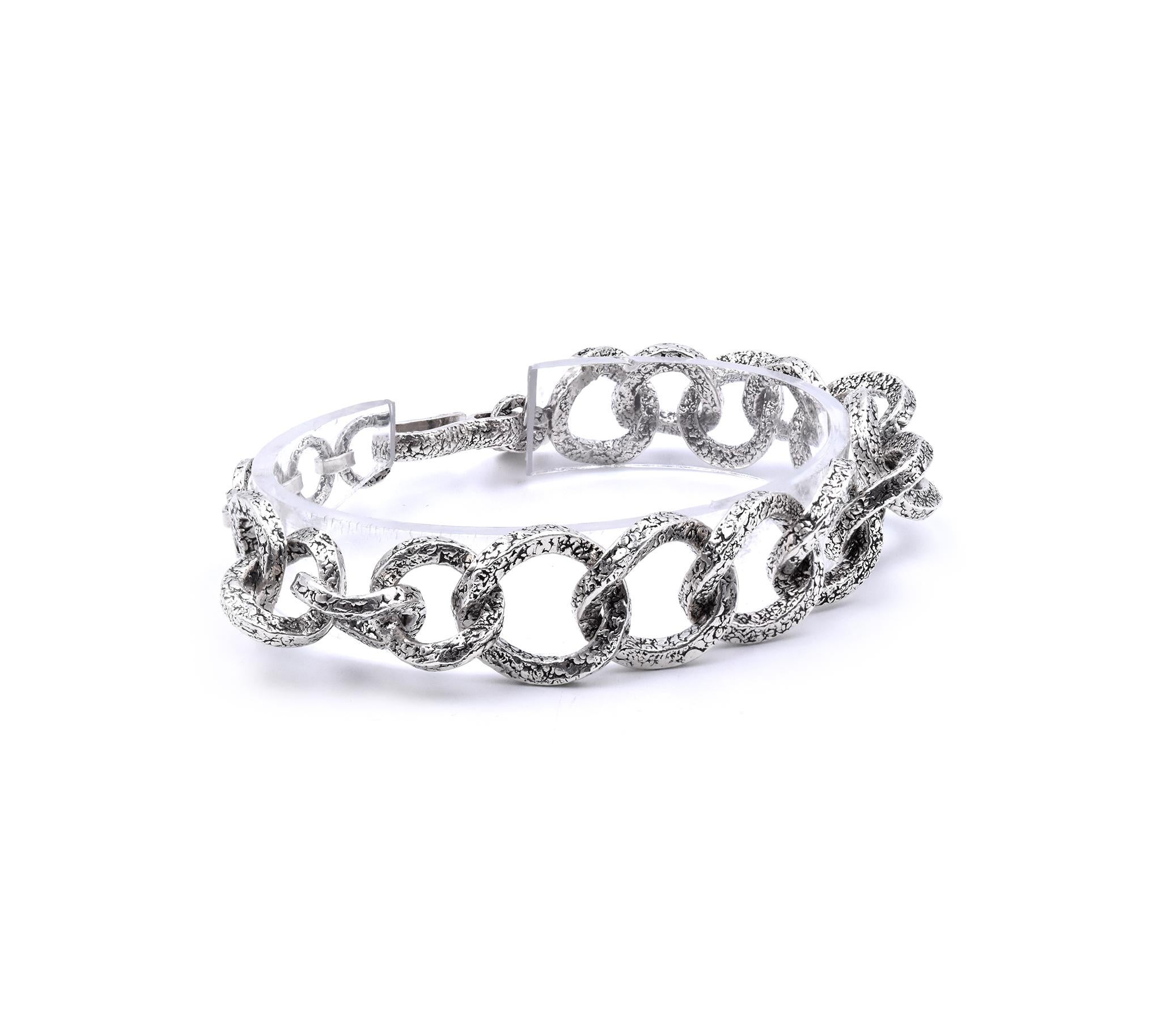 Designer: Tanj
Material: sterling silver
Weight: 39.38 grams
Measurements: bracelet measures 8-inches long
