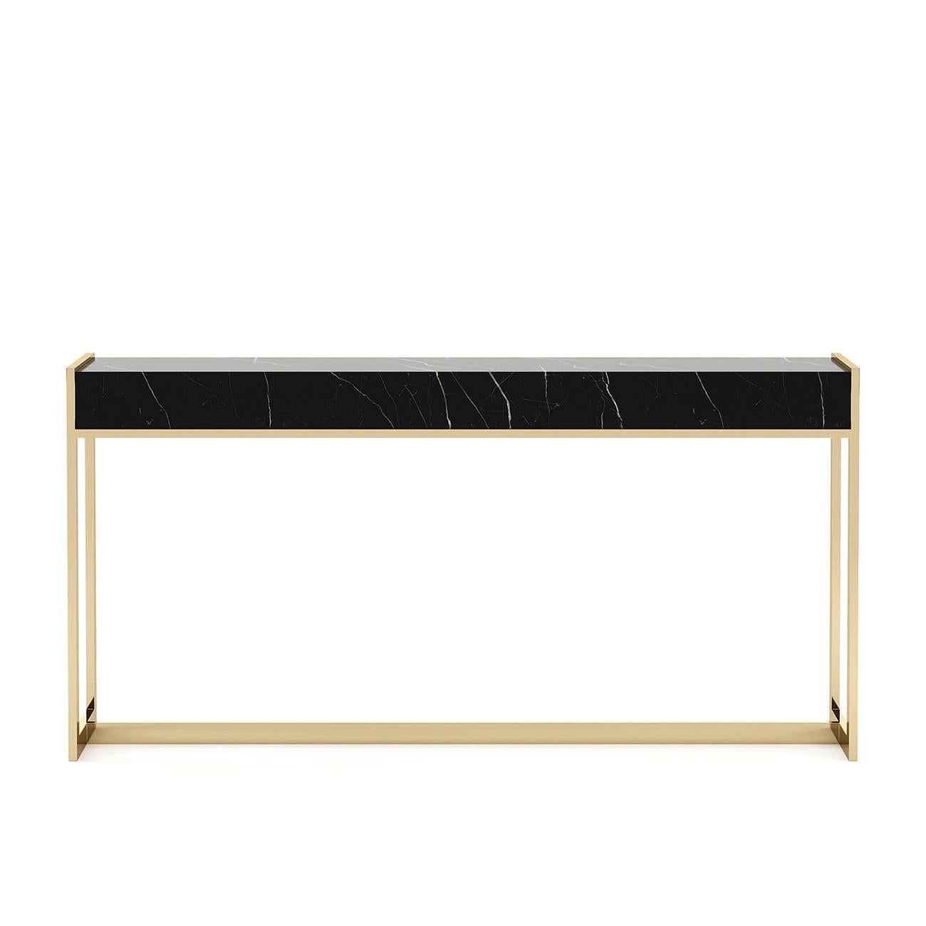 Table console tanja avec plateau en marbre Sahara noir et
avec une structure en acier inoxydable poli en finition dorée.
Également disponible avec d'autres finitions en acier inoxydable sur demande.