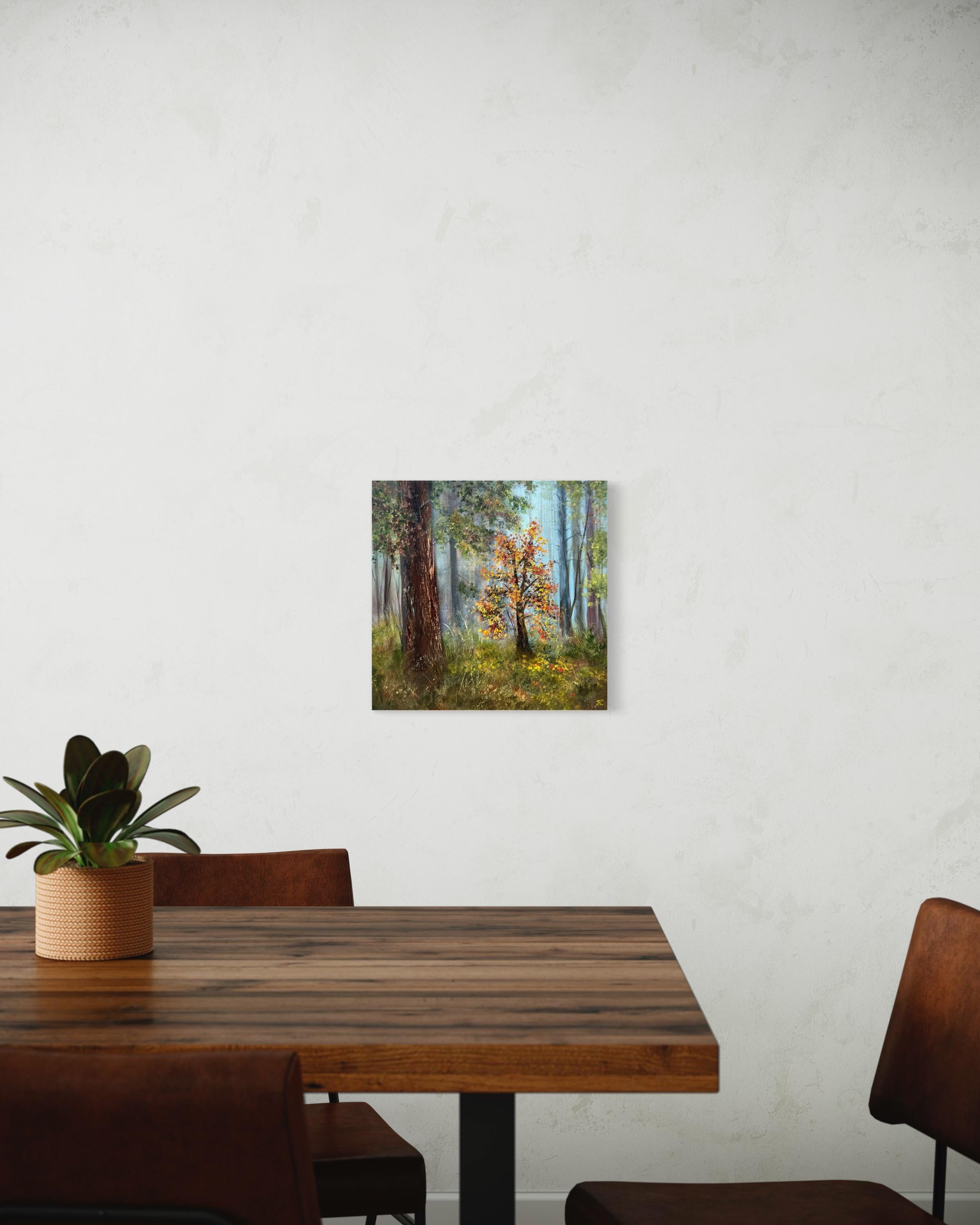 In the vibrant embrace of fall, a lone tree stands out, bathed in fiery colors, symbolizing individuality amidst the quiet symphony of the forest. Its brilliant leaves dance in contrast to the muted background, celebrating uniqueness and