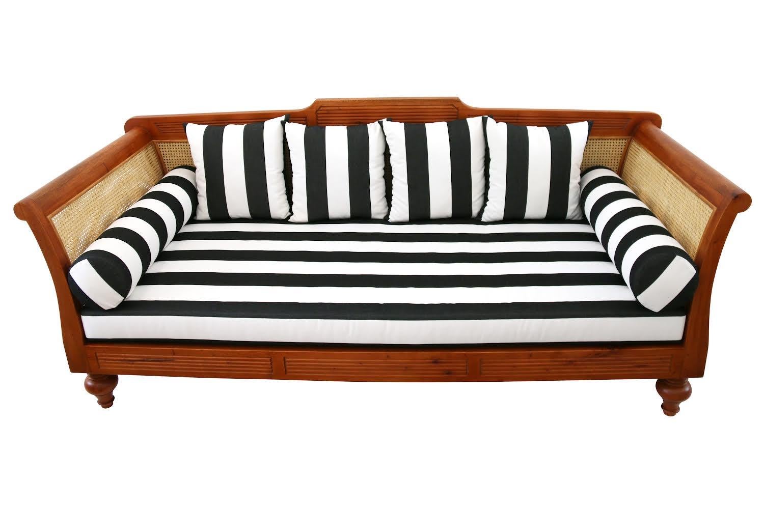 This is an early prototype of Nestify's classic, colonial style daybed. It has a tropical vibe that will bring romantic whimsy to your room. Made from sustainably sourced teak and natural hand woven cane (a fast growing, renewable resource), it also