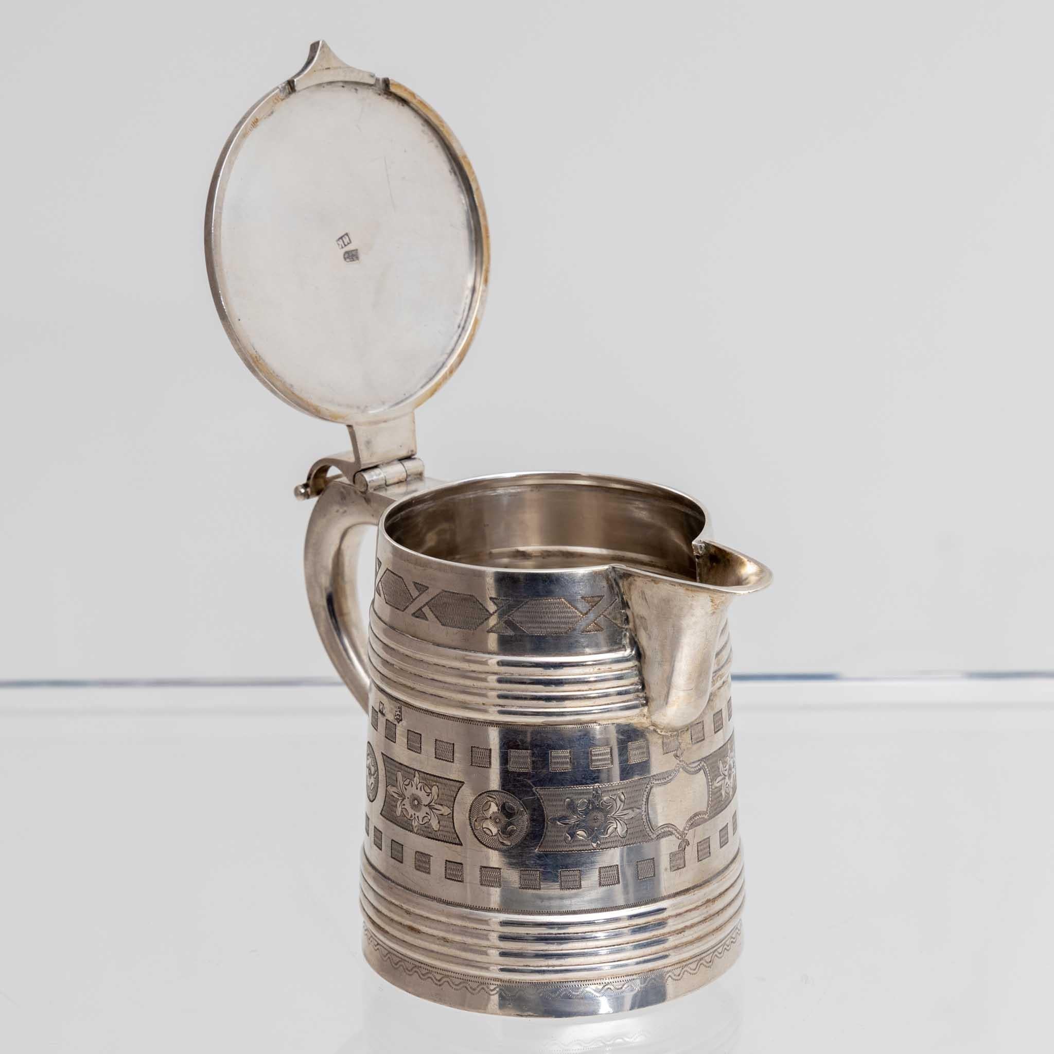 Silver tankard made by Ivan Kuzminin (1875-1895), stamped Moscow 1878, weight: 375 gr., h.: 13.5 cm.