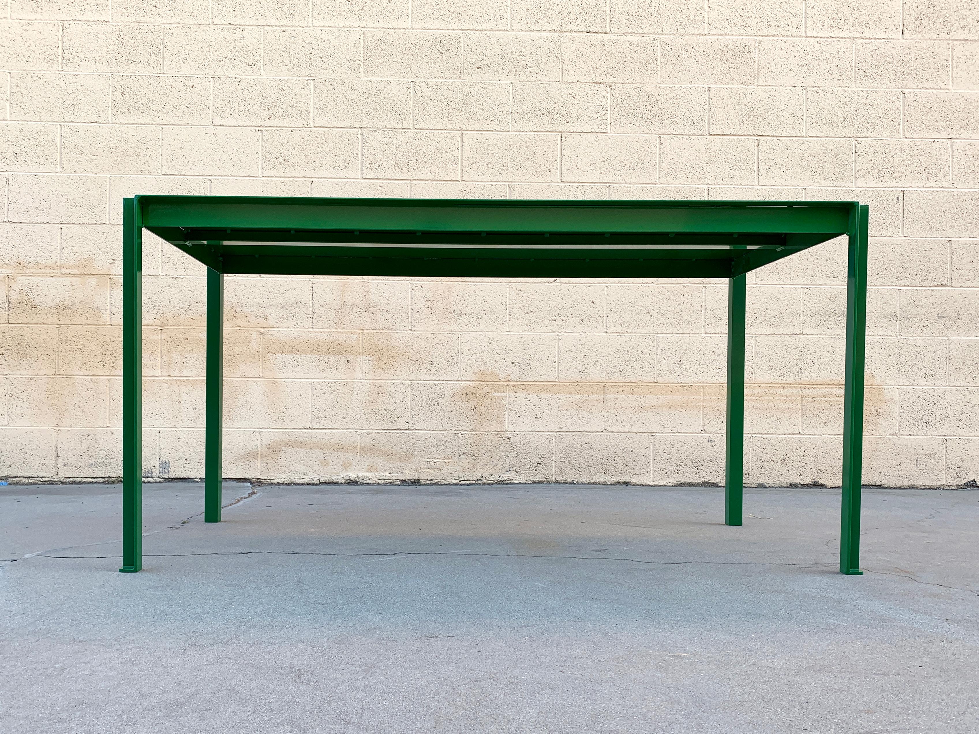 Return policy: This is a custom made piece. All sales final on custom orders and custom fabrications.

Multi-purpose steel table, custom made to order. Tanker inspired, yet sleek and minimalist, ideal for use as a dining table, in a work space or as