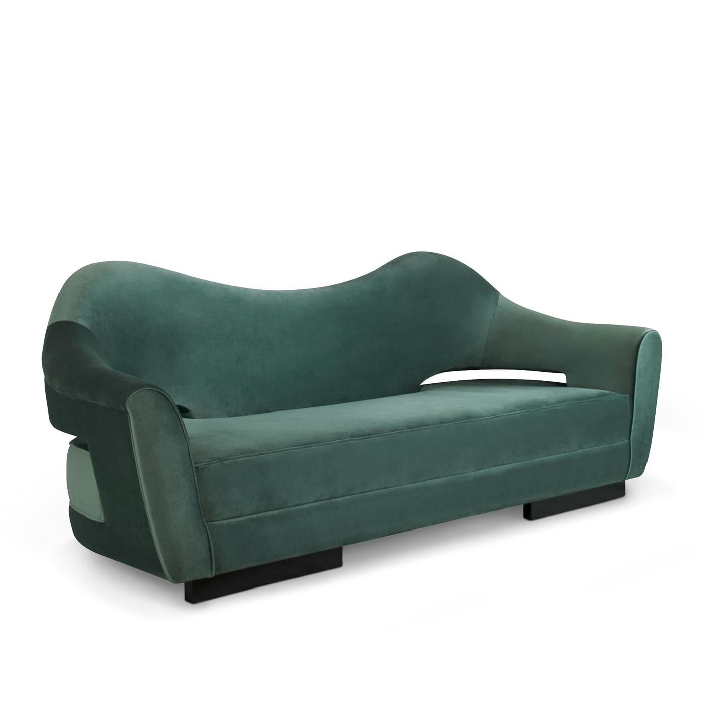 Sofa Tanner with solid wood structure, upholstered and
covered with soft green velvet fabric. Sofa's feet in solid
ash in matte wenge stained finish.