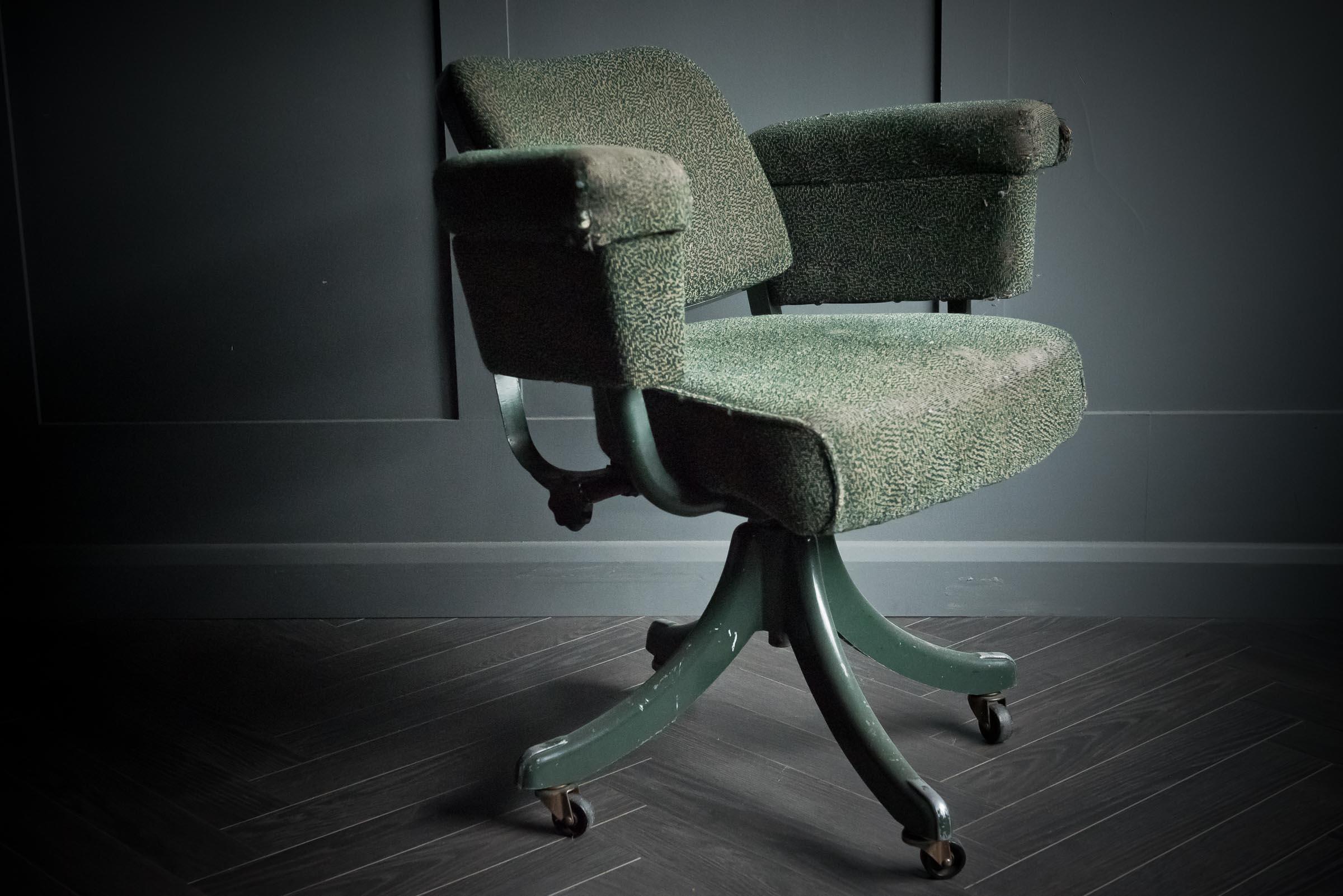 Tansad office chair in original green boucle upholstery.