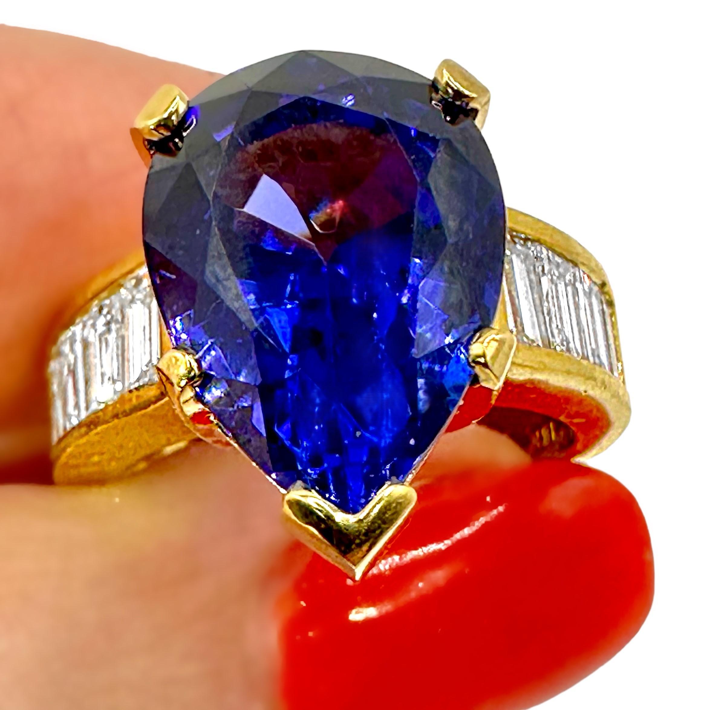 Tantalizing Pear Shaped Tanzanite Ring with Baguette Diamonds in 18K Yellow Gold For Sale 5
