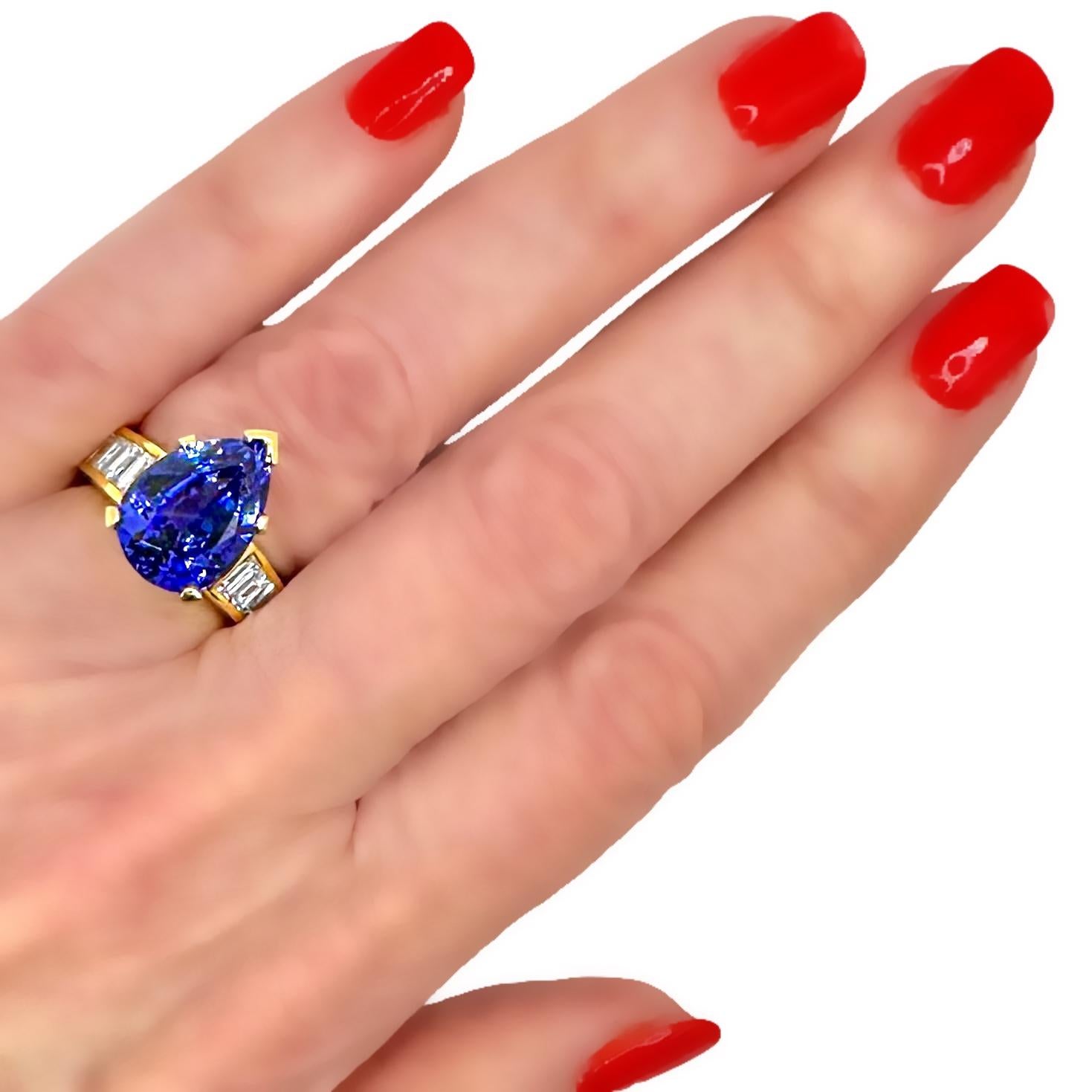 Tantalizing Pear Shaped Tanzanite Ring with Baguette Diamonds in 18K Yellow Gold For Sale 6