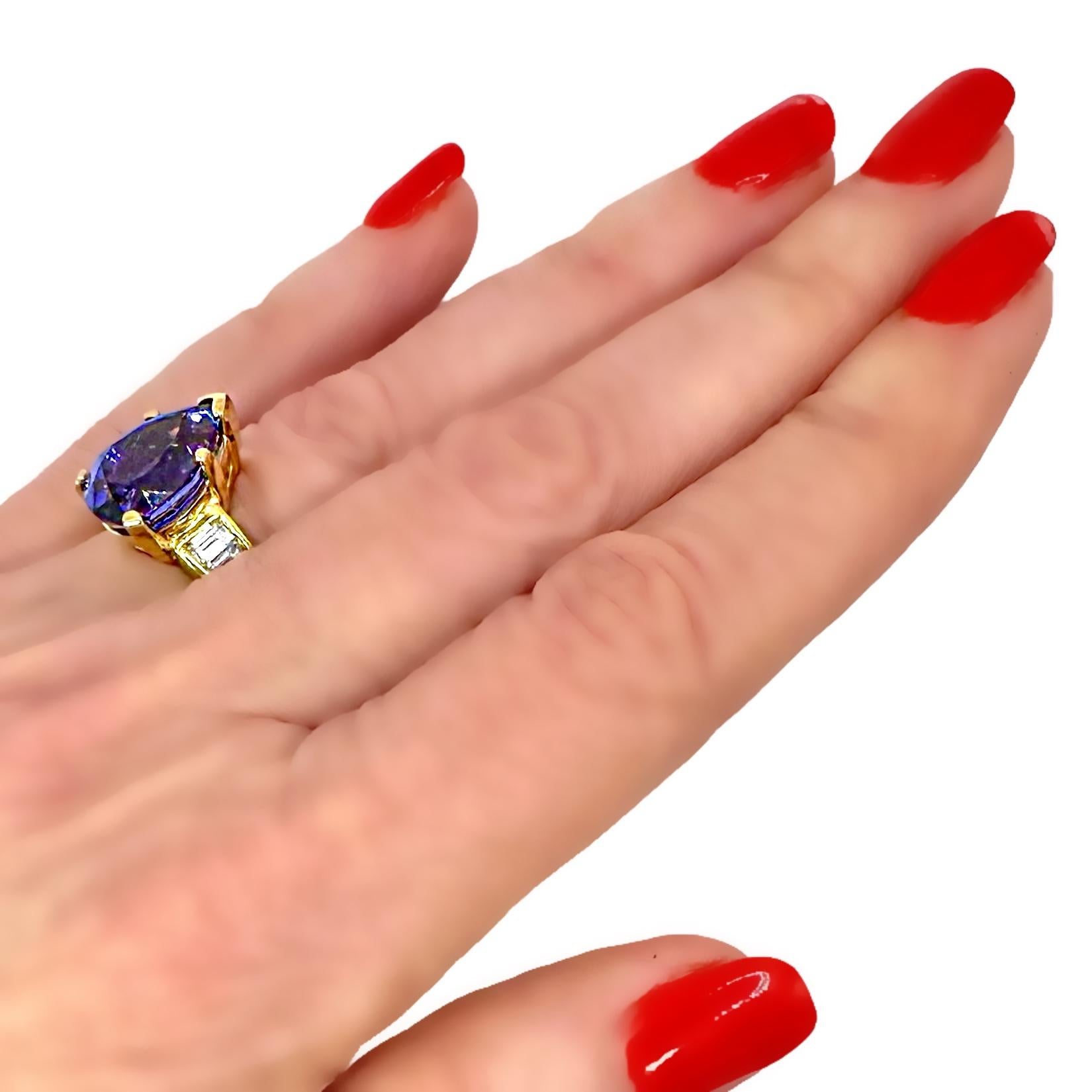 Tantalizing Pear Shaped Tanzanite Ring with Baguette Diamonds in 18K Yellow Gold For Sale 7