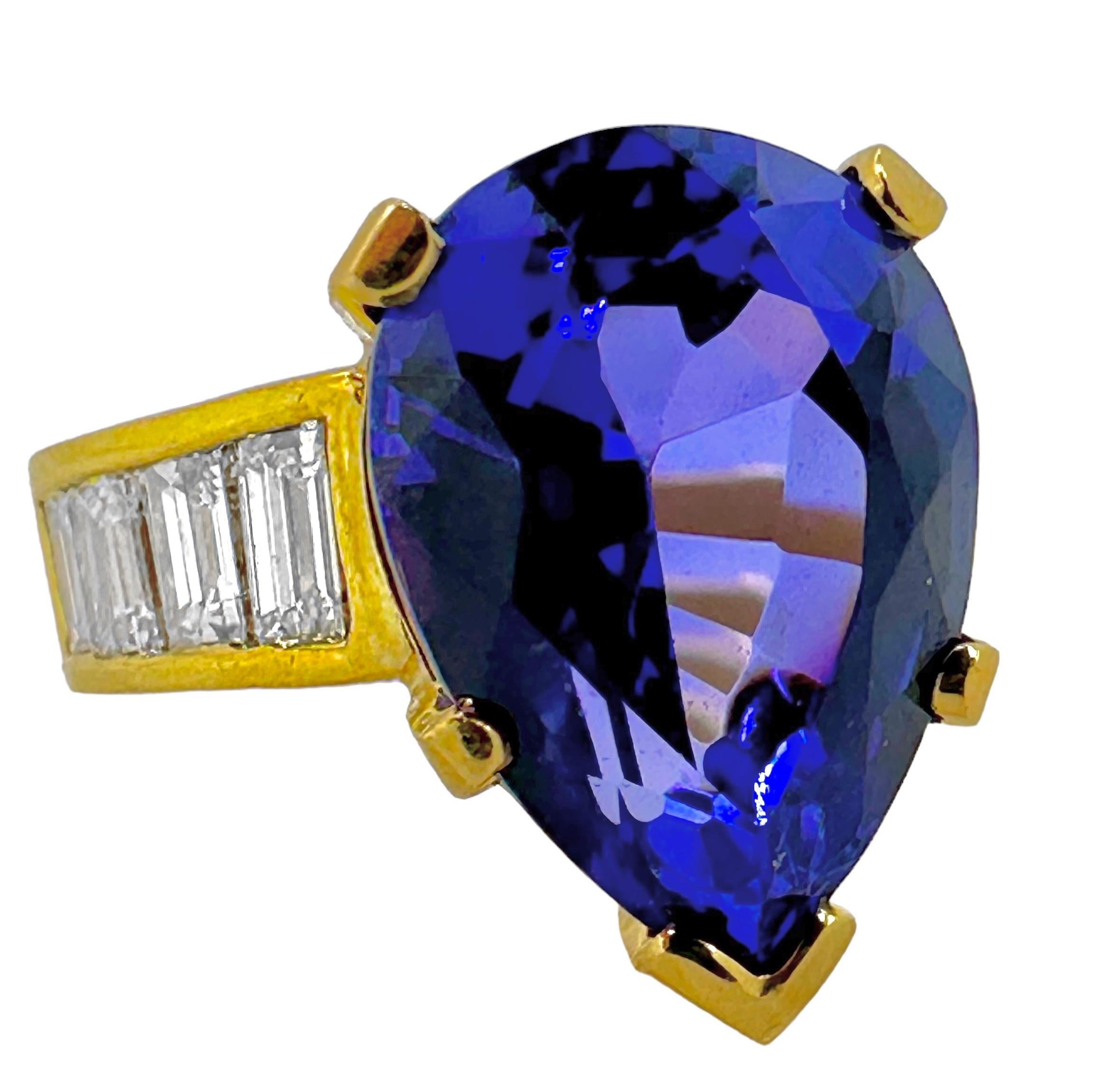 An 18K yellow gold ring centered around a brilliant, richly colored pear-shaped Tanzanite weighing approximately 7.50ct. This amazing Tanzanite is an ideal pear shape cut and features a mixture of beautiful shades of blue and vibrant violet. The