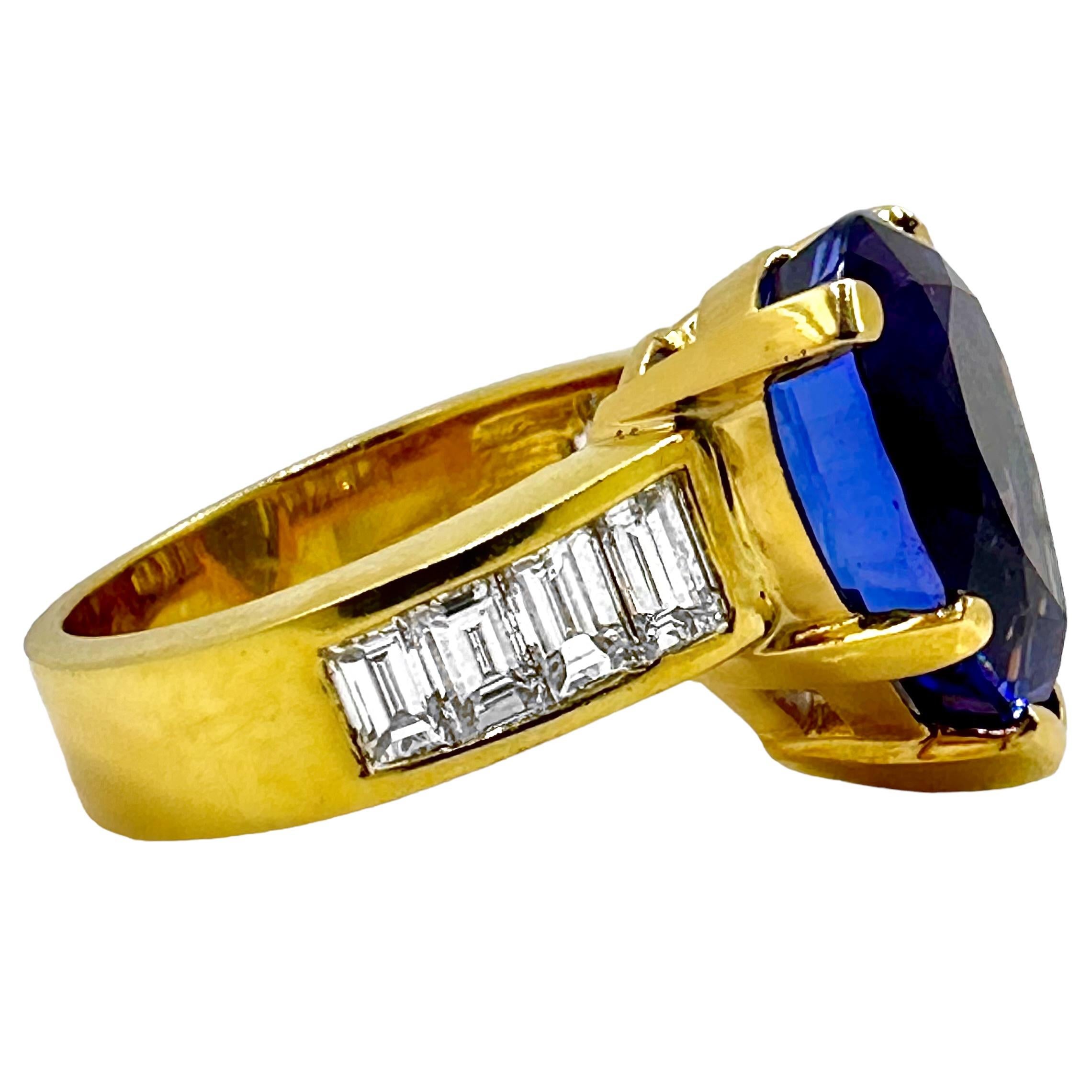 Tantalizing Pear Shaped Tanzanite Ring with Baguette Diamonds in 18K Yellow Gold In Good Condition For Sale In Palm Beach, FL