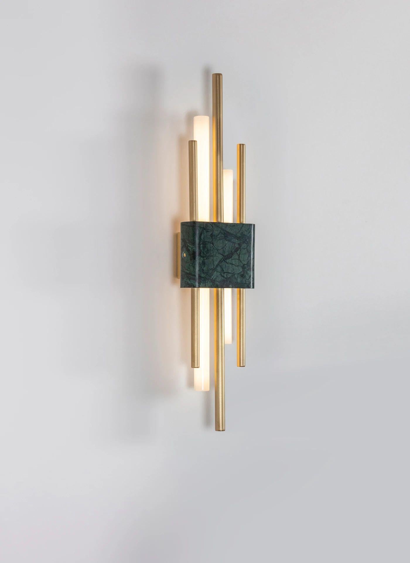 Tanto wall light, double, green marble by Bert Frank
Dimensions: 15 x 9 x H 65 cm
Materials: brushed brass, white carrara marble

When Adam Yeats and Robbie Llewellyn founded Bert Frank in 2013 it was a meeting of minds and the start of a