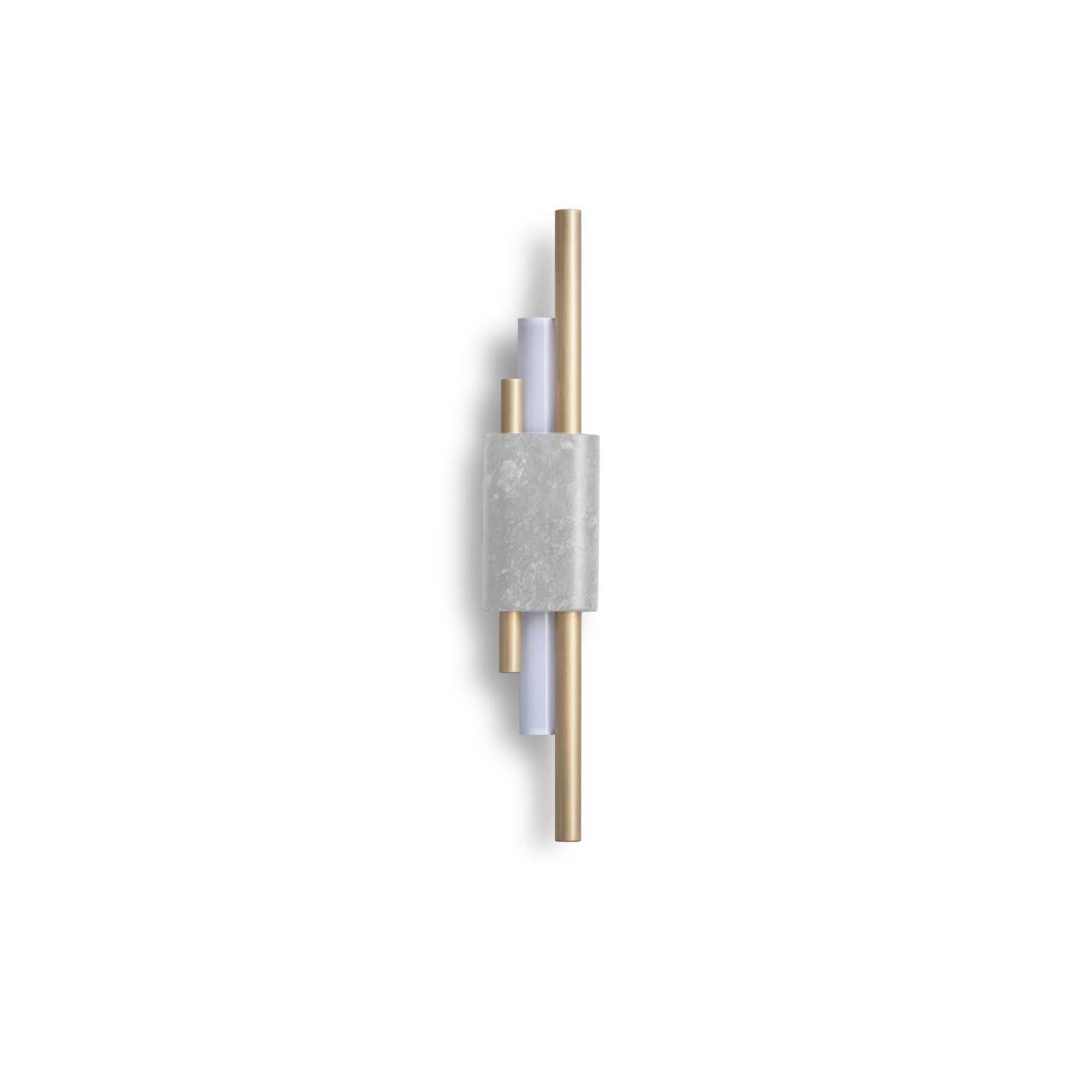 Tanto wall light - Small - White by Bert Frank
Dimensions: 45 x 9 x 9 cm
Materials: Brushed brass, white Carrara marble

When Adam Yeats and Robbie Llewellyn founded Bert Frank in 2013 it was a meeting of minds and the start of a collaborative