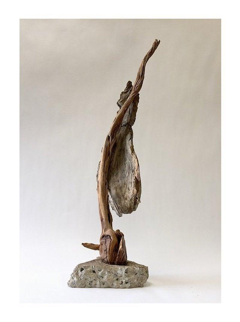 Ceramic clay, found wood, concrete, India ink, underglaze, birch leaves, raw pigments

One of a kind sculpture.
Measurements:
48.5 x 15.5 x 10 inches

Hard wisdom which has her reflecting, as she ages, on her experiences of birth, loss, and