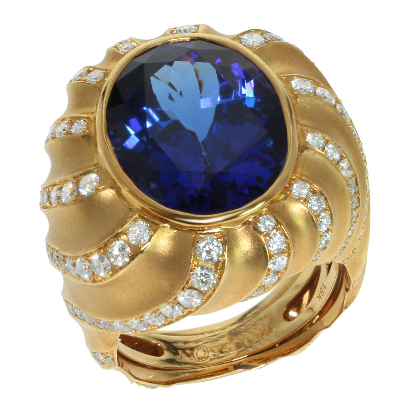 Tanzanite 15.86 carat Diamond 18 Karat Yellow Gold Ring

Just take a look on this rich 