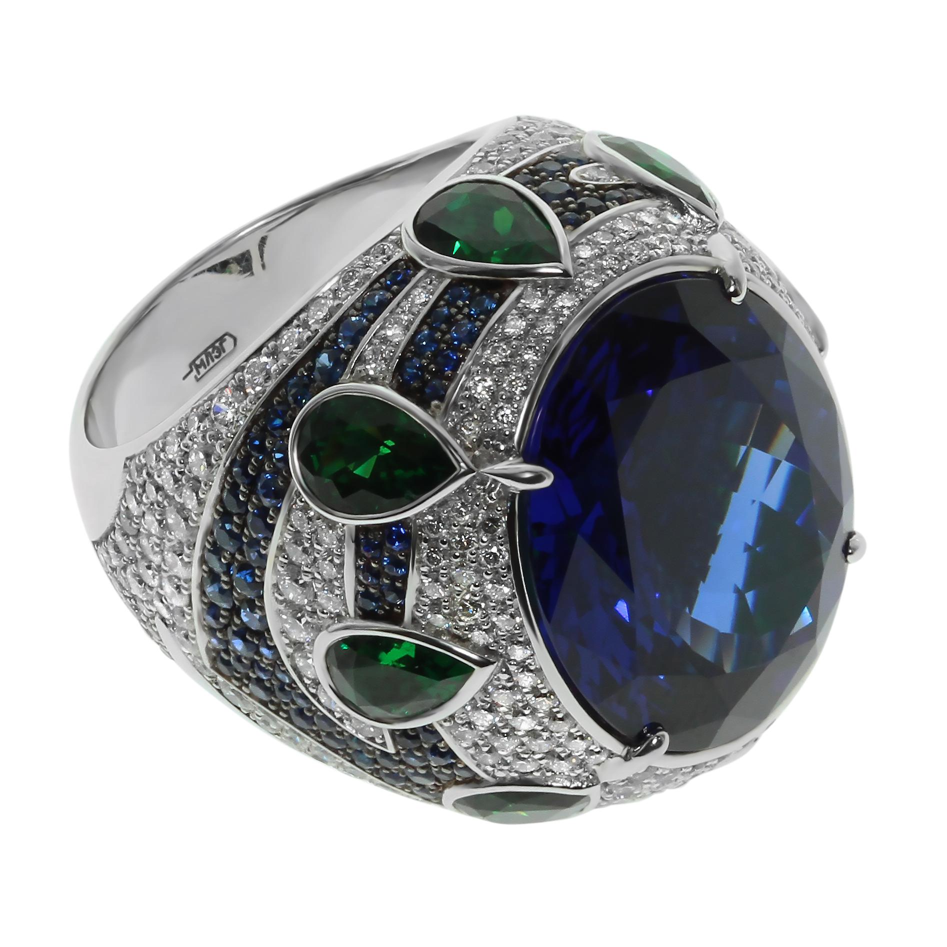 Tanzanite 19.82ct Diamonds Tsavorites 18 Karat White Gold Oriental Magrib Ring

Pure Oriental, Pure Imperial style. If you love 1000&1 Night story, and dream about Arabian Night - this ring will be a star of your collection. Absolutely stunning rich