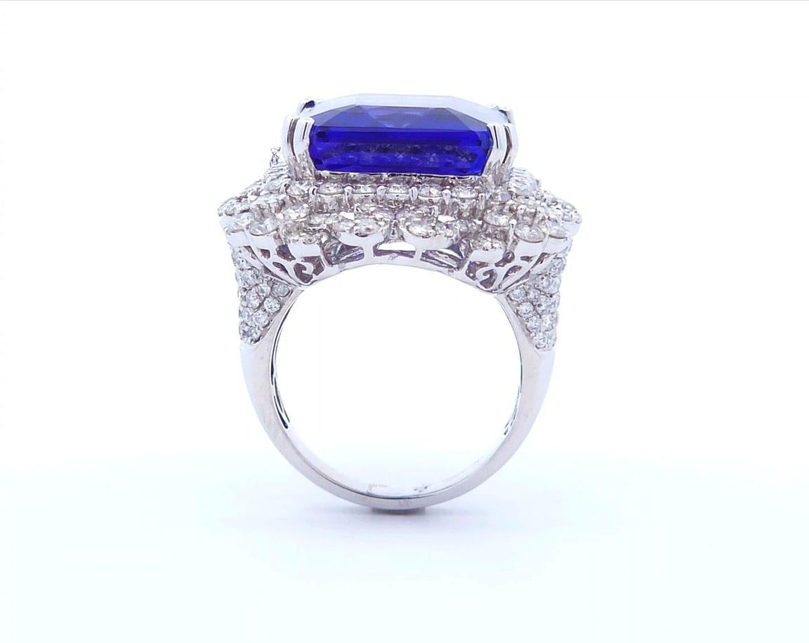 Emerald Cut 23 Carat Tanzanite Ring in 18K Gold For Sale