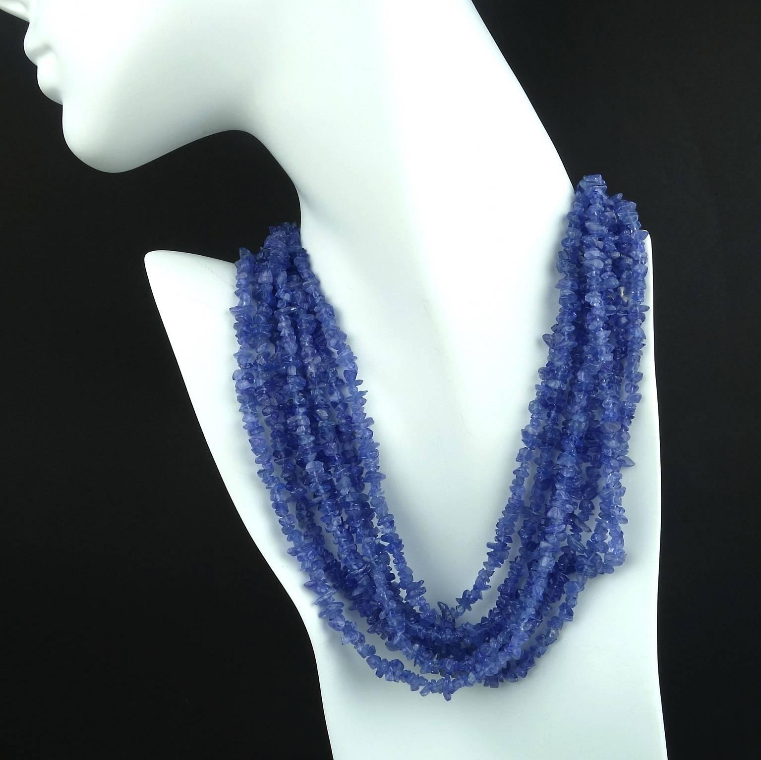 Gorgeous four continuous strands of Tanzanite chips to drape around your neck.  These can be twisted and worn as a collar using either of the two clasps, gold or silver tone.   The long strands can be tied or clasped with a brooch in front.  These