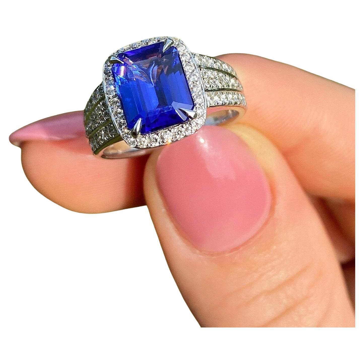 Anello con gemma tanzanite 3.41Ct e diamanti, oro massiccio 14 Kt Whiting, 7US, IGI