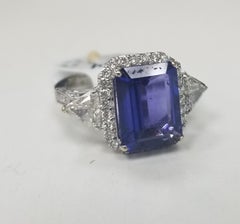 Tanzanite 3.53cts. 18k White Gold Diamond Halo W/ Trillions and Round Diamonds