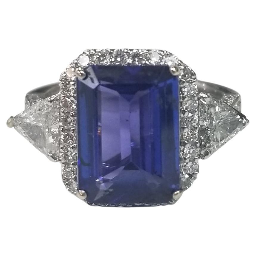 Tanzanite 3.53cts. 18k White Gold Diamond Halo W/ Trillions and Round Diamonds For Sale