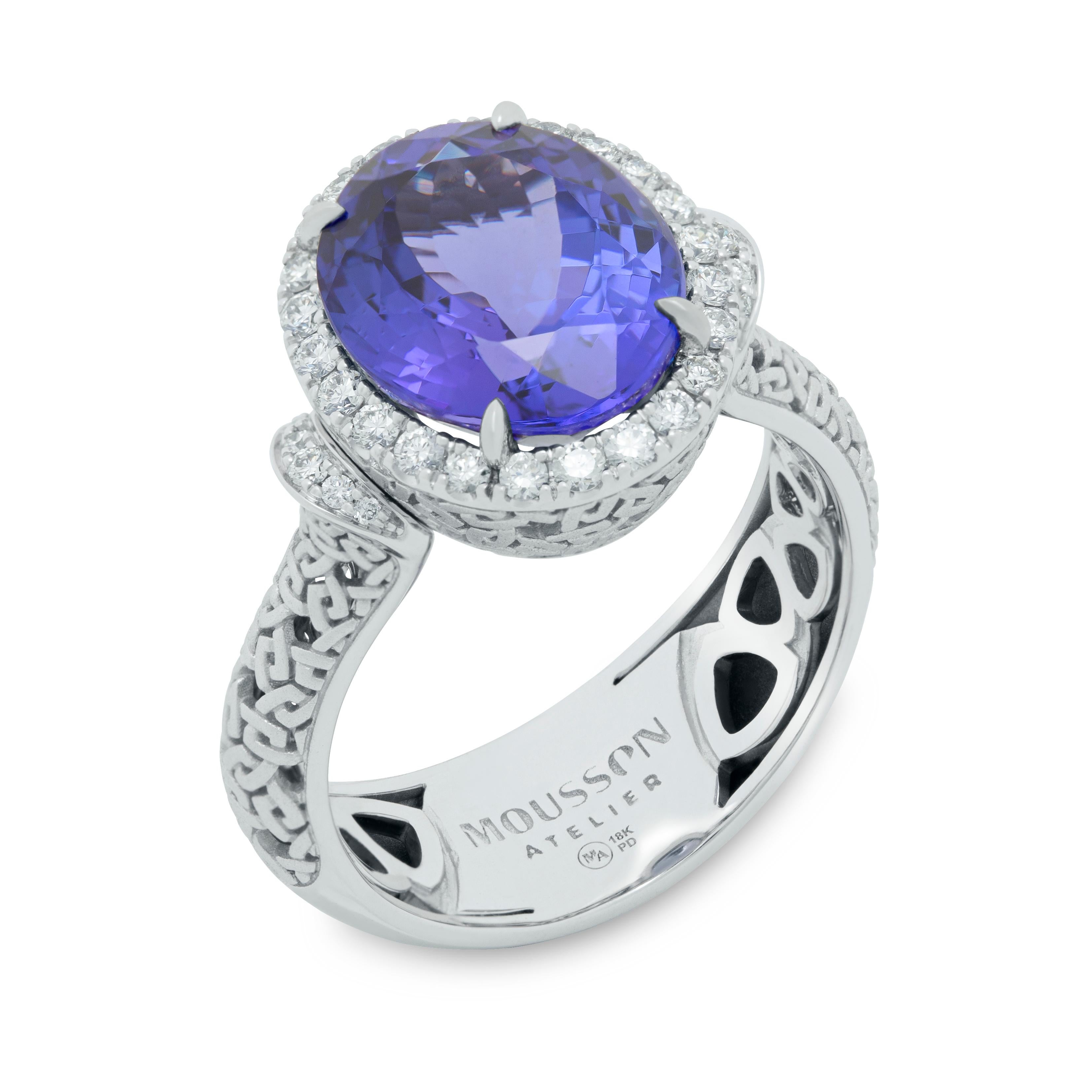 Tanzanite 5.48 Carat Diamonds 18 Karat White Gold New Classic Ring
Introducing a Ring crafted from delicate 18 Karat White Gold, which in a trio with 5.48 Carat Tanzanite and 34 Diamonds around it, creates a truly noble look. But the main detail