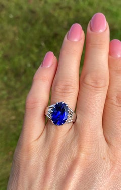 Tanzanite 7.37Ct and Diamonds gemstone Ring, Solid 18 Kt., White and Yellow Gold
