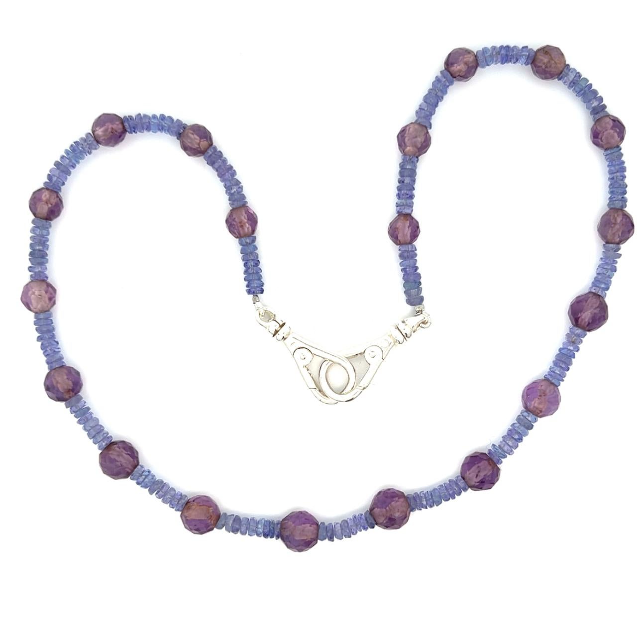 Indulge in the mesmerizing hues of tanzanite and amethyst with this exquisite necklace, meticulously crafted to captivate the senses. Each bead tells a story of elegance and allure, showcasing the natural beauty of these stunning gemstones.
The