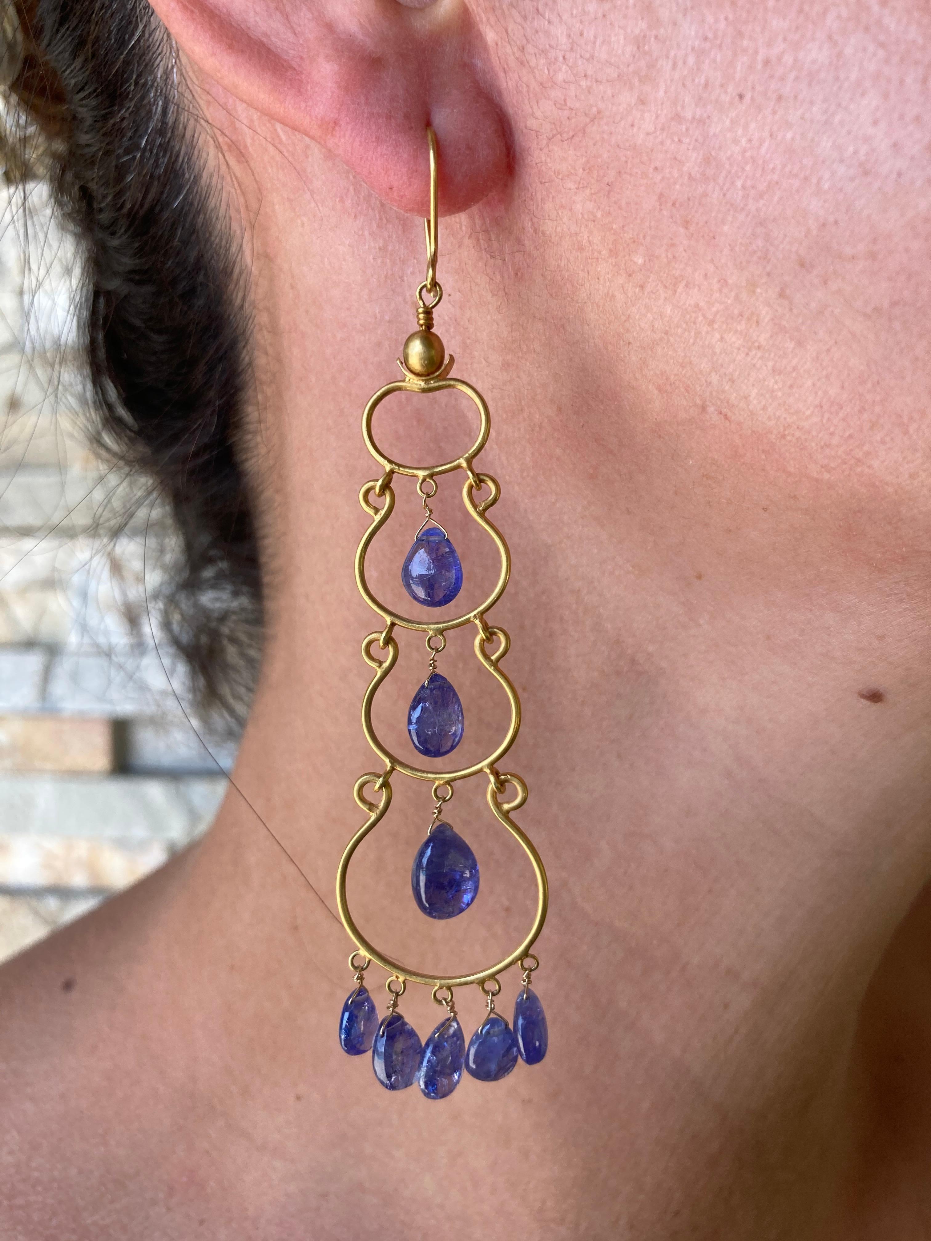 Inspired by the ancient Roman Jewelry. These are the work of a goldsmith. It's believed that tanzanite has the ability to stimulate three chakras: the throat, the third eye and the crown. This means that it has the ability to activate psychic