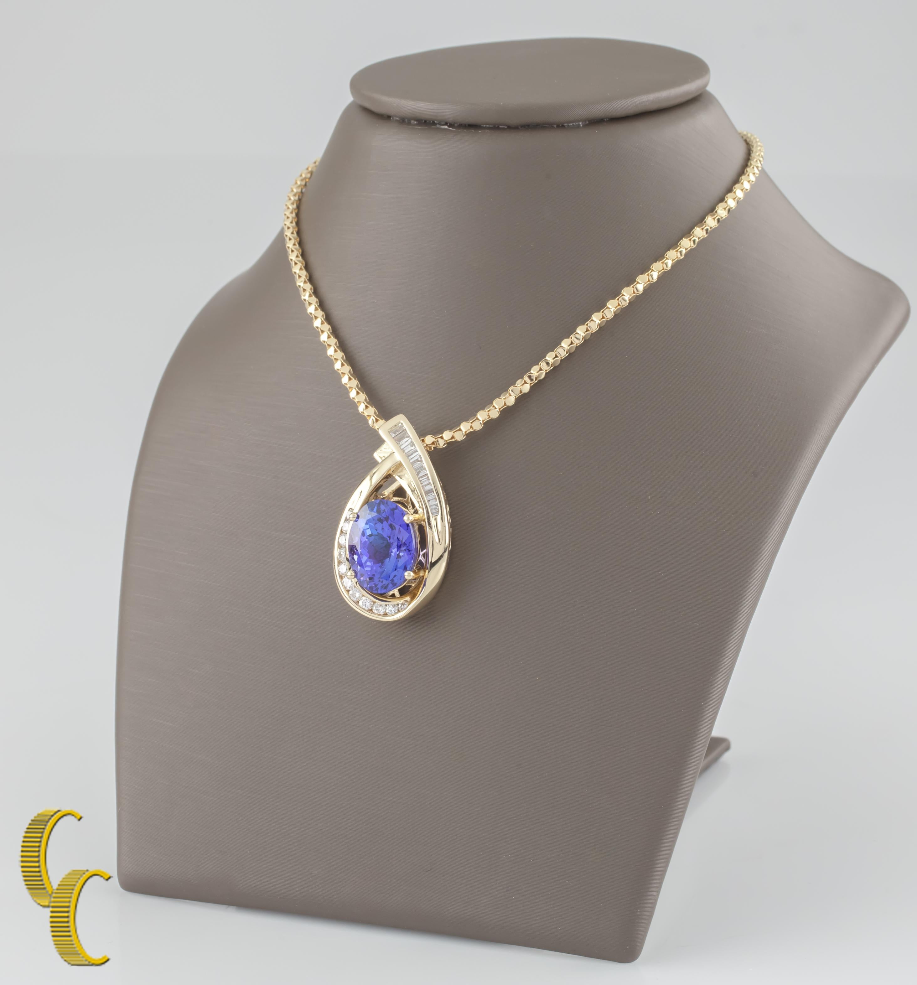 14k Yellow gold Tanzanite & Diamond Pendant
Total Diamond Weight: 0.43 Carats
Tanzanite Weight: 5.20 Carats
Pendant Size: 26 mm Long, 18 mm Wide
Includes 17