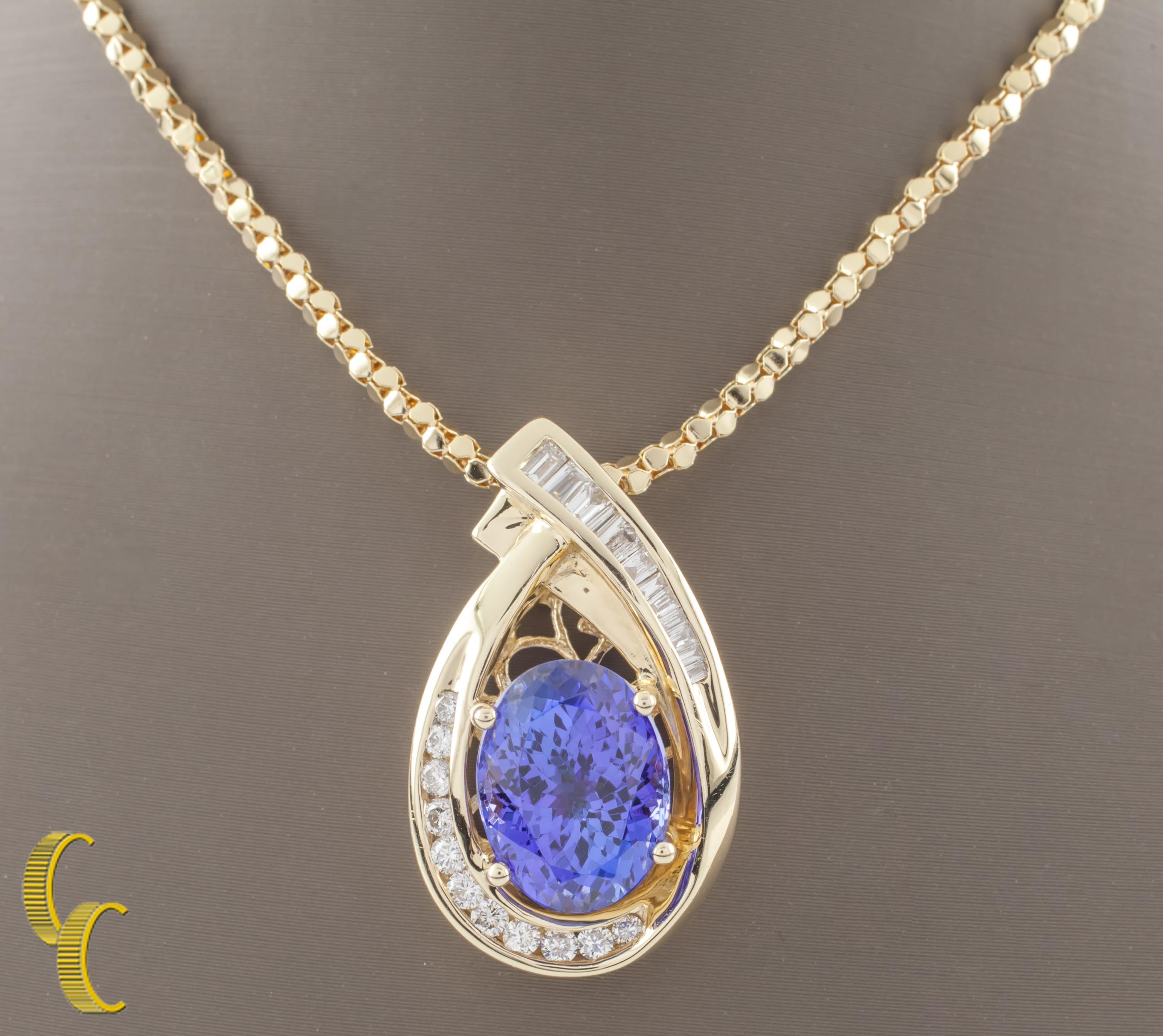 Oval Cut Tanzanite and Diamond 14 Karat Yellow Gold Pendant Necklace with Chain