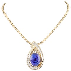 Tanzanite and Diamond 14 Karat Yellow Gold Pendant Necklace with Chain