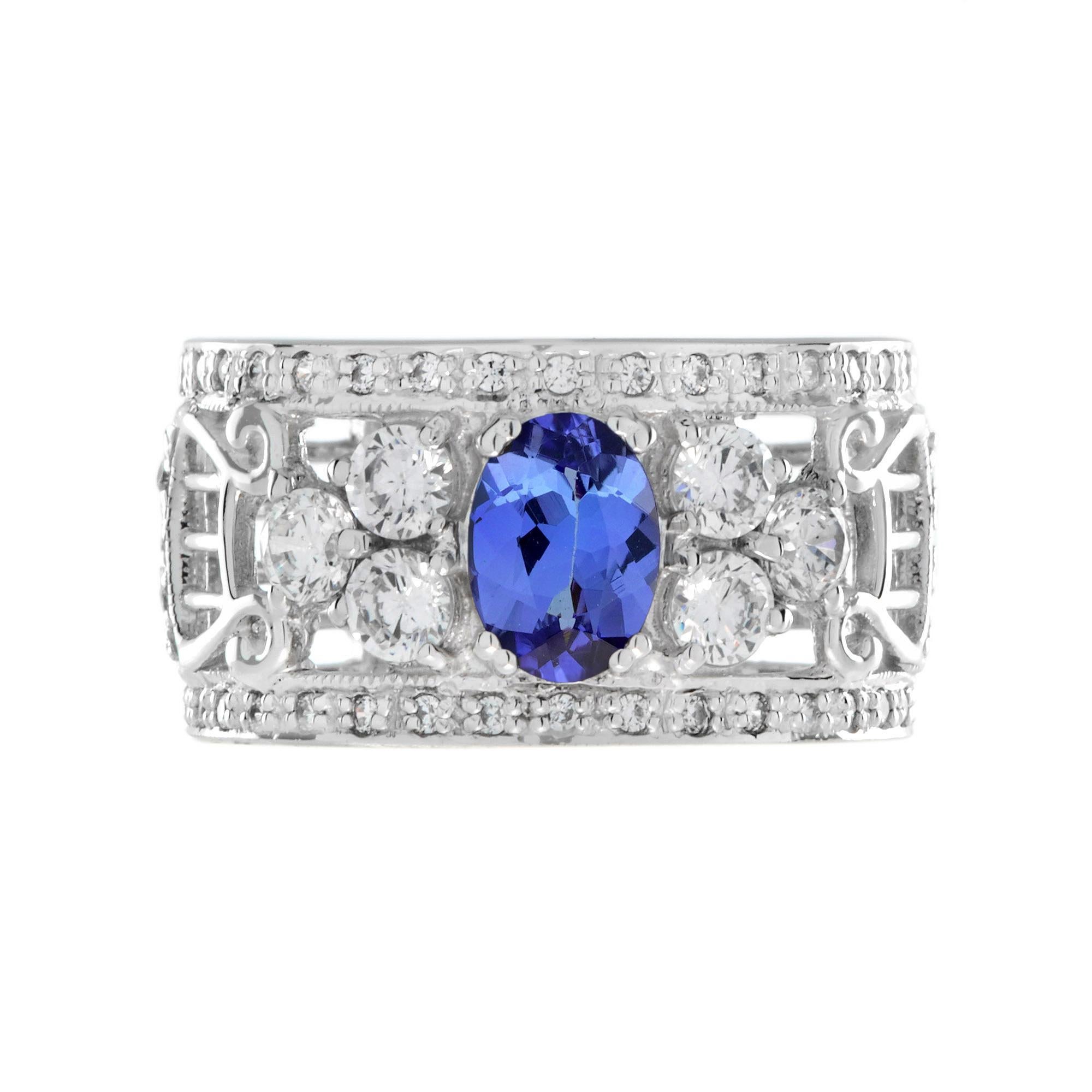 Taglio ovale Anello di fidanzamento largo con tanzanite e diamanti in stile Art Déco in oro bianco 18 carati in vendita
