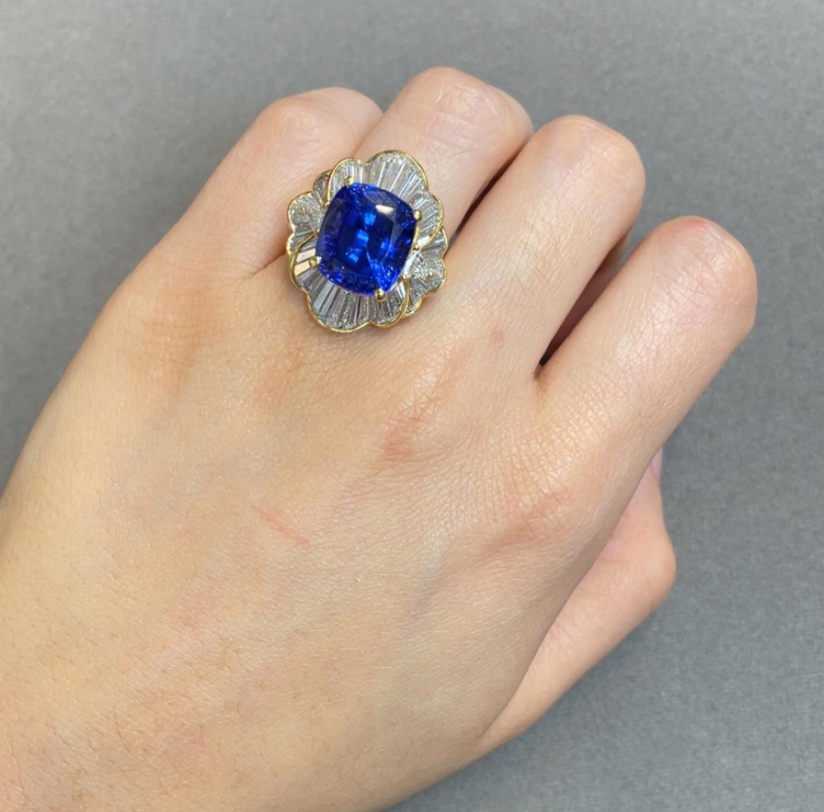 Tanzanite and Diamond Ballerina Ring 

A yellow gold ring set with cushion cut tanzanite, complemented by baguette cut diamonds.

Approximate Tanzanite Weight: 9.98 ct
Ring Size: 7
Complimentary resizing 
Metal Type: 18 carat gold