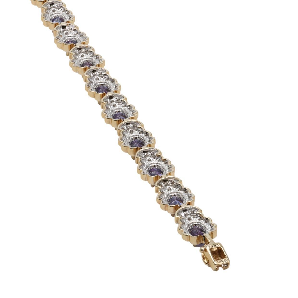 Tanzanite and Diamond Bracelet set in 14k Yellow Gold In Excellent Condition For Sale In Tampa, FL