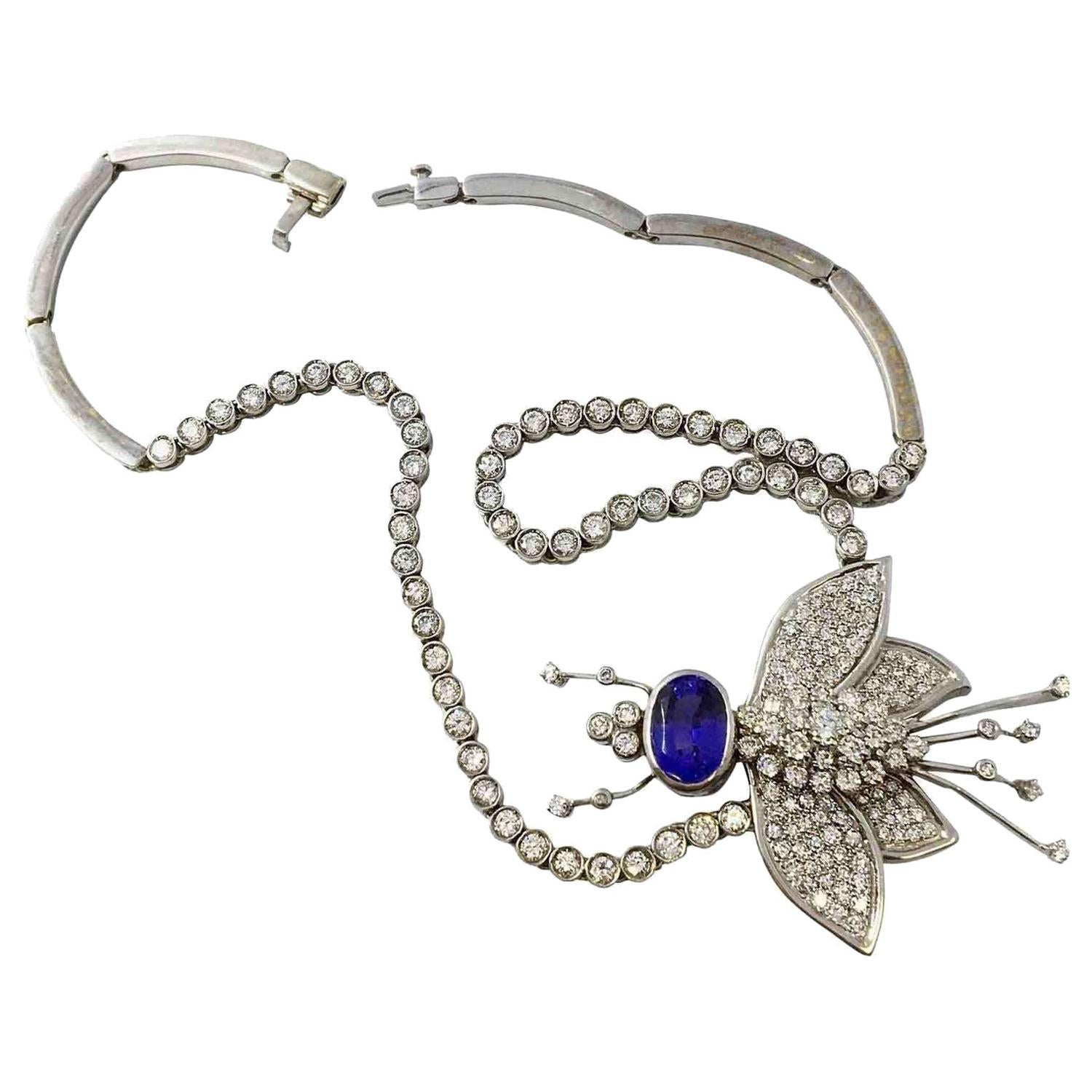 Collier bourdon en or blanc avec pendentif en tanzanite et diamant