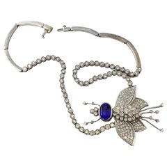 Collier bourdon en or blanc avec pendentif en tanzanite et diamant