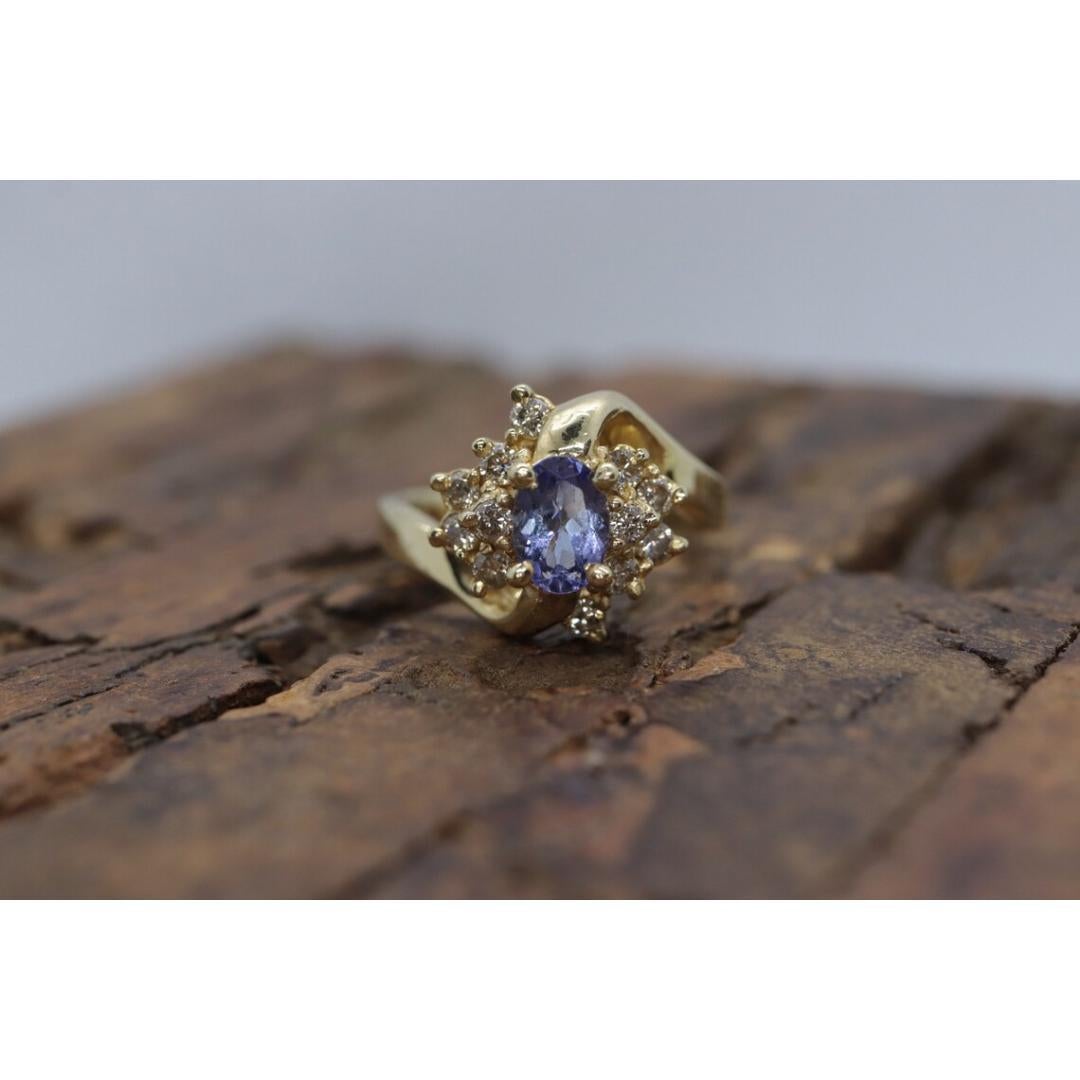 Tanzanite and diamond Cluster ring. 14k Blue Tanzanite and Diamond Halo Bypass For Sale 6