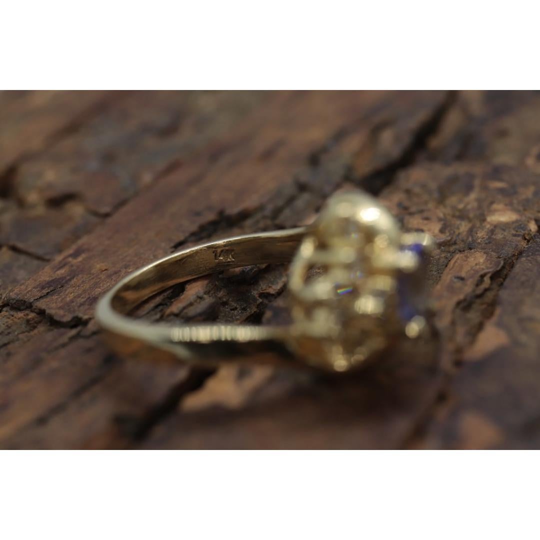 Women's Tanzanite and diamond Cluster ring. 14k Blue Tanzanite and Diamond Halo Bypass For Sale