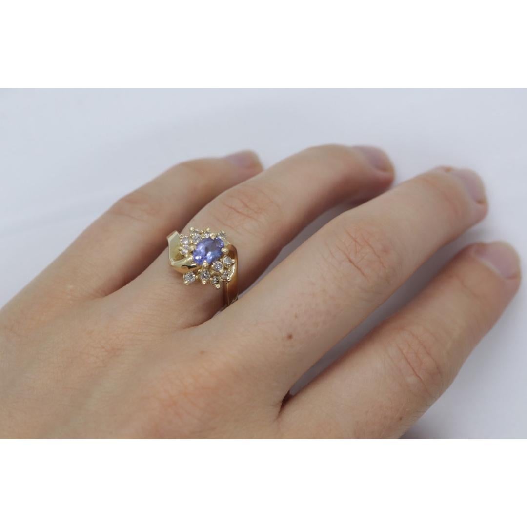 Tanzanite and diamond Cluster ring. 14k Blue Tanzanite and Diamond Halo Bypass For Sale 1
