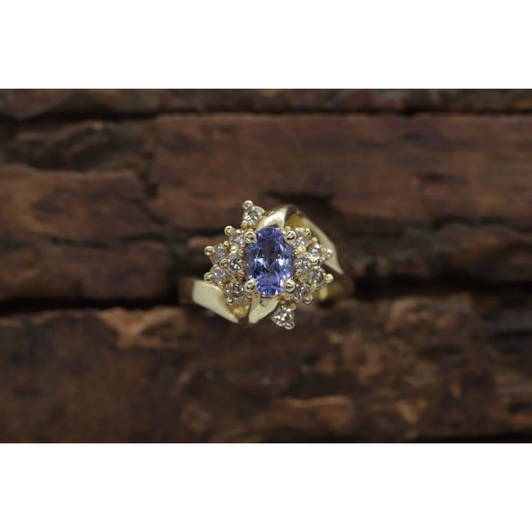 Tanzanite and diamond Cluster ring. 14k Blue Tanzanite and Diamond Halo Bypass For Sale 3