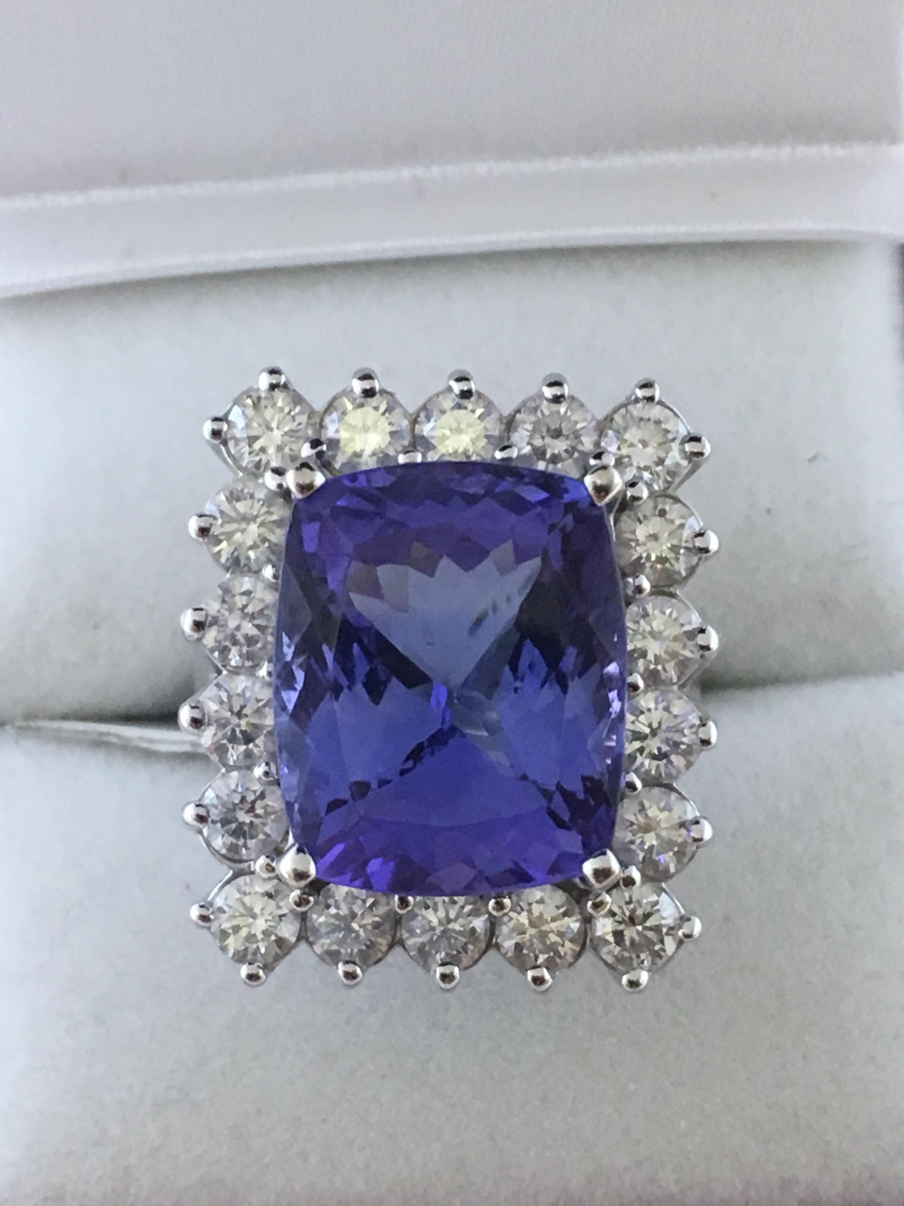 Natural Tanzanite Approximately 10 Carat and Approx 1.50 Carat White Diamond Set In 18 Karat White gold.The size of the ring in 6.5 if needed you can resize at near by Jewelry repair store.

