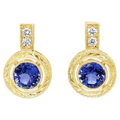 Orecchini con tanzanite e diamanti in oro giallo 18 carati, 2,94 carati totali