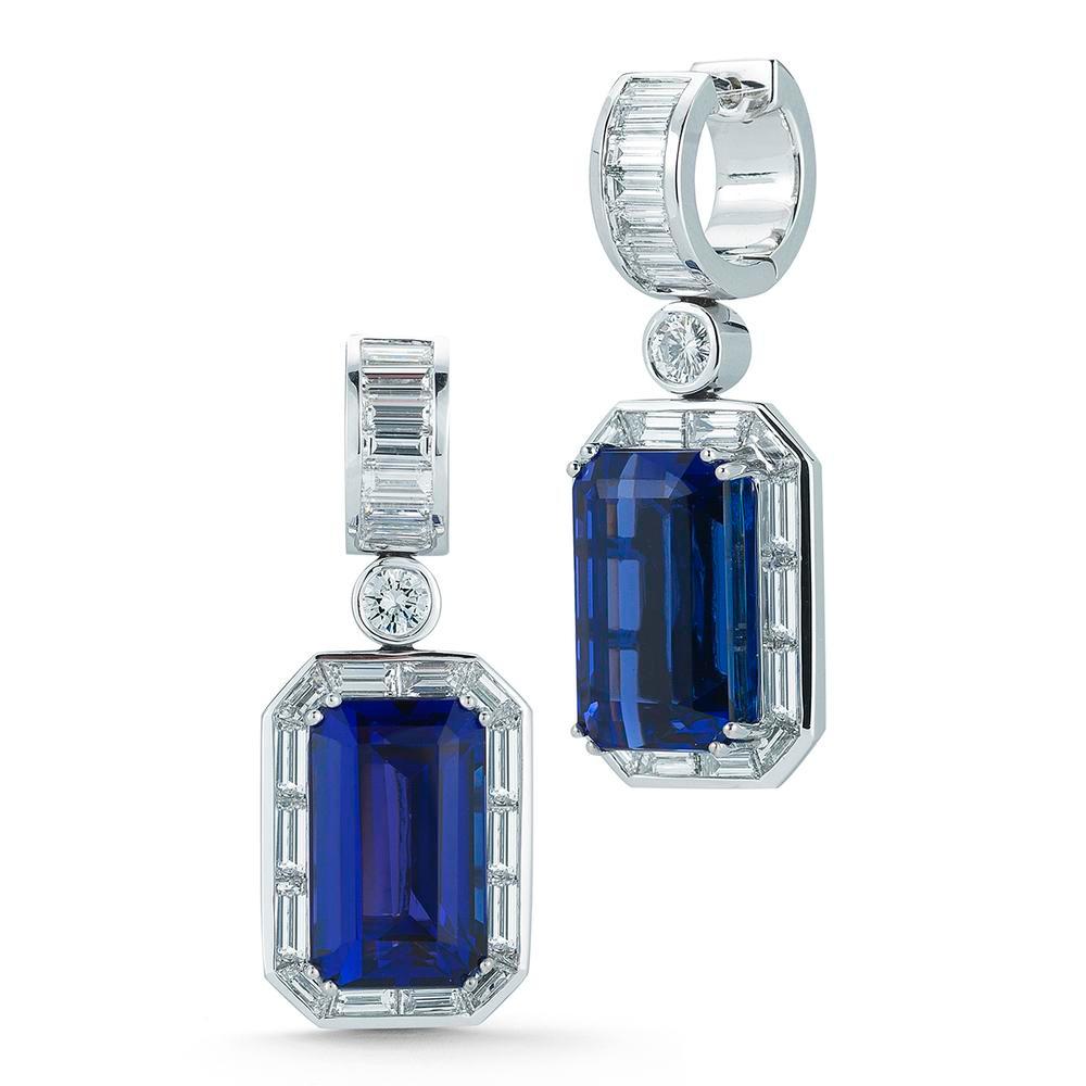 TANZANITE AND DIAMOND EARRING
With a sophisticated Art Deco influence, these classic earrings paint a striking portrait of Tanzanite and diamond.
 
Item:	# 01732
Setting:	18K W
Lab:	GIA
Color Weight:	24.81 ct. of Tanzanite
Diamond Weight:	4.48 ct.
