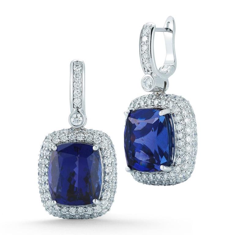 TANZANITE AND DIAMOND EARRING A soft cushion shaped micropavÃ© halo lends sparkle to beautifully matched cushion Tanzanites. Item: # 01689 Metal: 18k W Color Weight: 28.05 ct. Diamond Weight: 5.71 ct.
