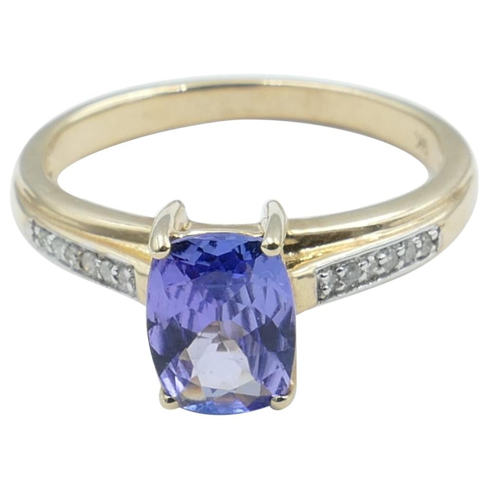 Tanzanite and Diamond Modern or Dress Ring Set in Yellow and White Gold For Sale