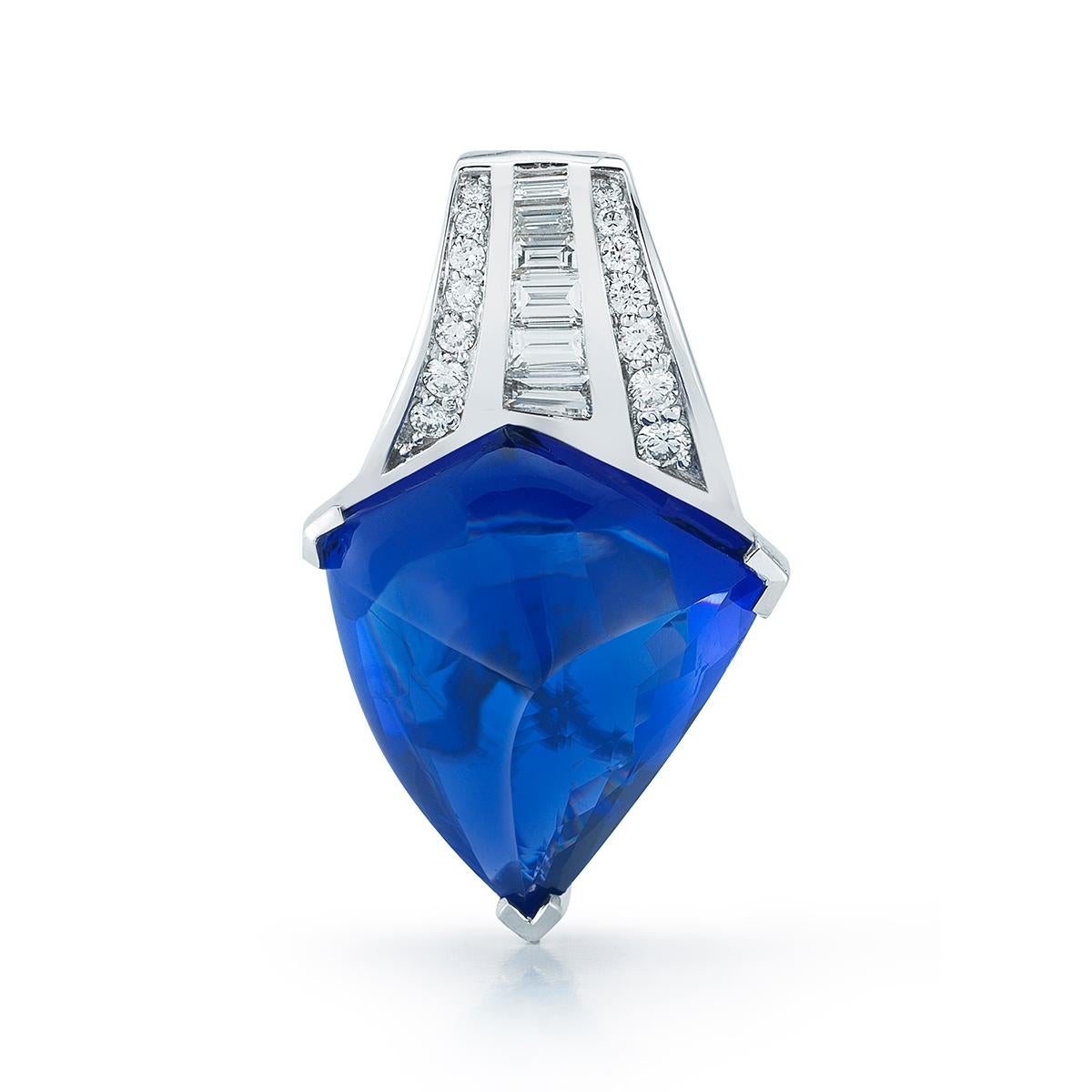 A uniquely cut tanzanite shines in an asymmetrical diamond slide pendant.
Item:	# 01662
Setting:	18K W
Color Weight:	30.75 ct. of Tanzanite
Diamond Weight:	0.85 ct. of Diamonds