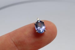 Tanzanite and diamond Pendant. PT850 Platinum Dainty Oval Tanzanite Solitaire