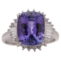 Tanzanite and diamond platinum cluster ring