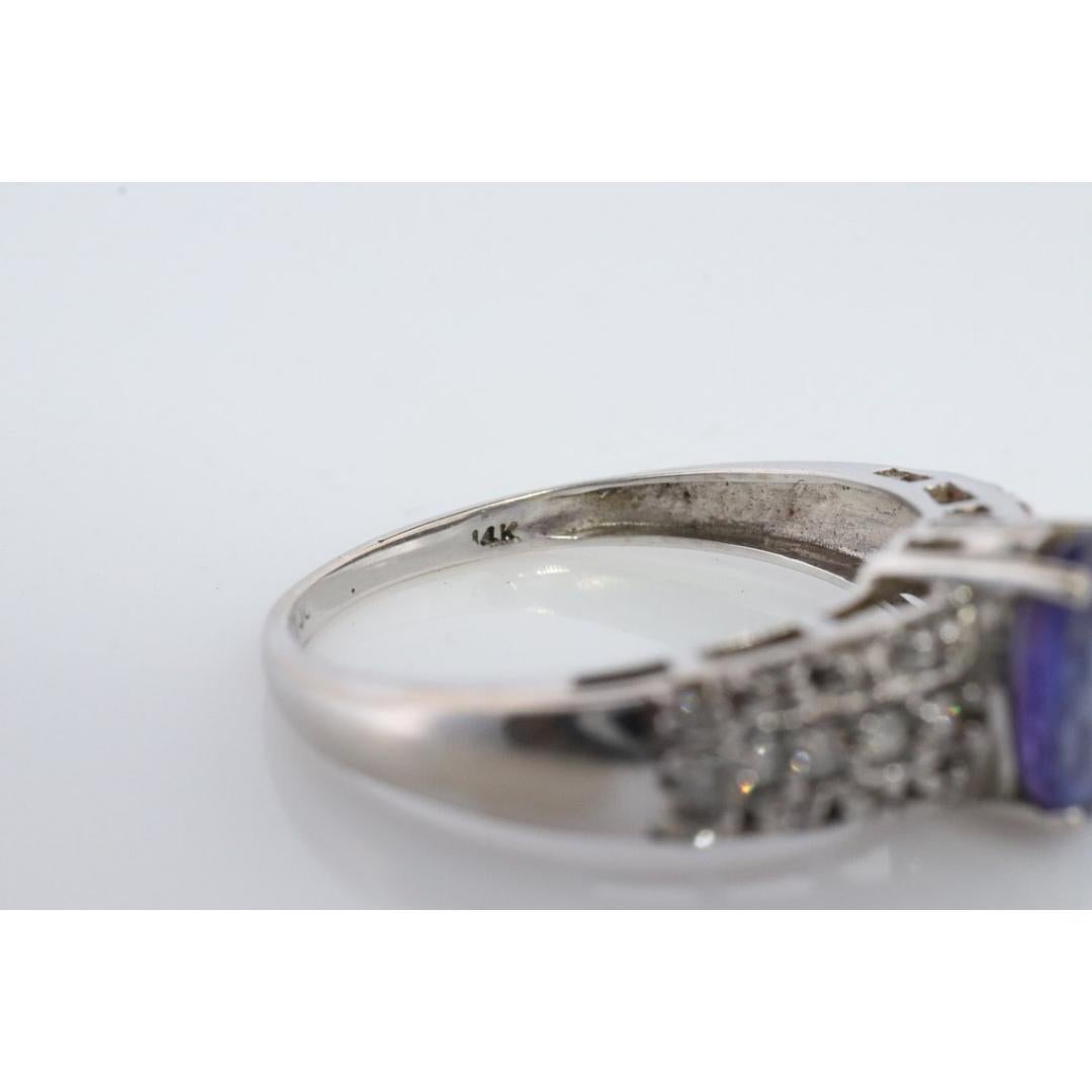 Tanzanite and diamond ring. 14k Blue Tanzanite solitaire. In Good Condition For Sale In Port Charlotte, FL