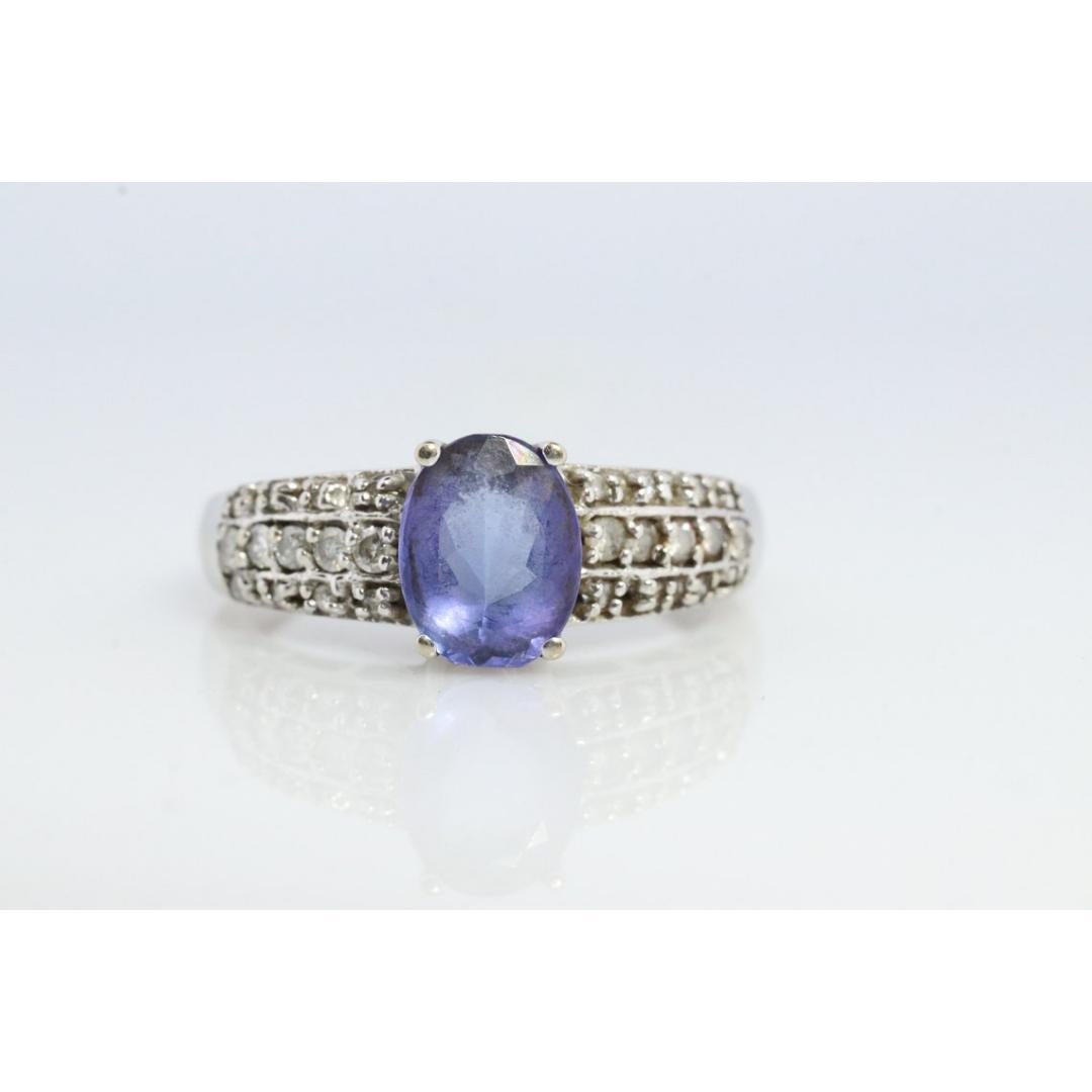 Women's Tanzanite and diamond ring. 14k Blue Tanzanite solitaire. For Sale