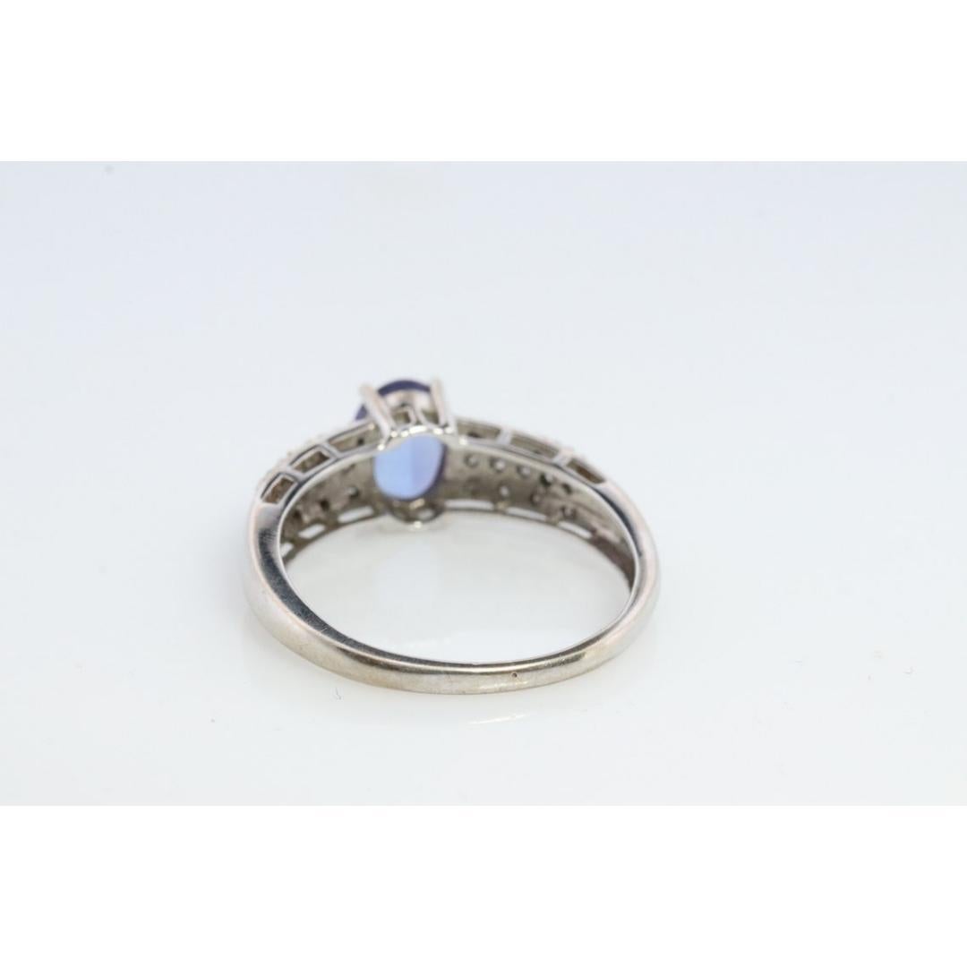 Tanzanite and diamond ring. 14k Blue Tanzanite solitaire. For Sale 1